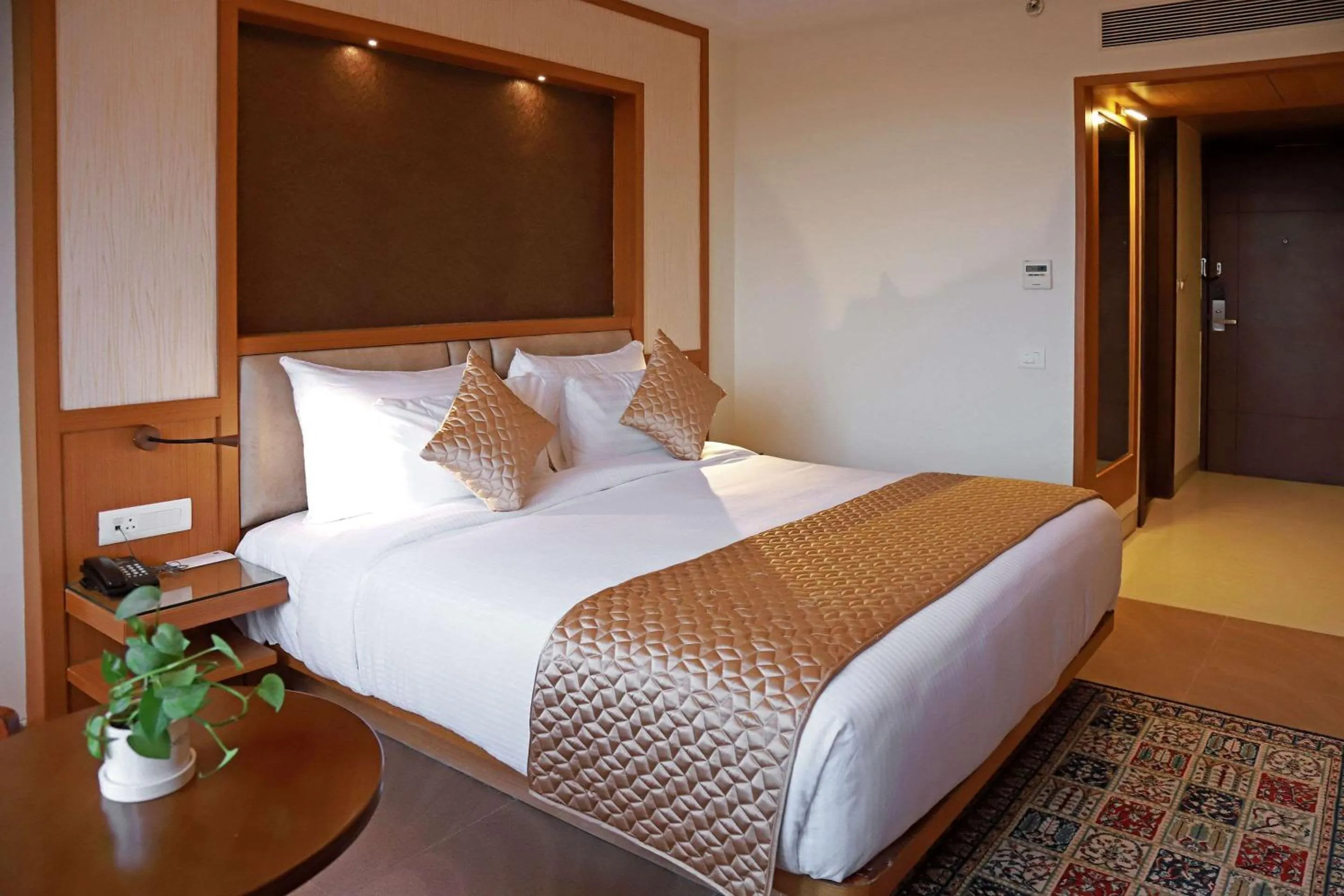 Photo of the whole room, Bed in Clarion Inn Indore