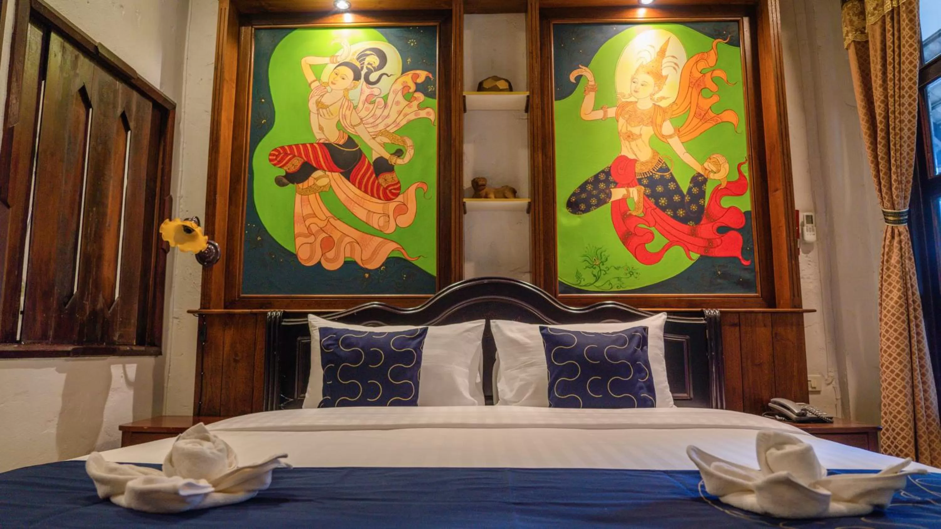 Bed in Cheva Gallery Boutique Hotel