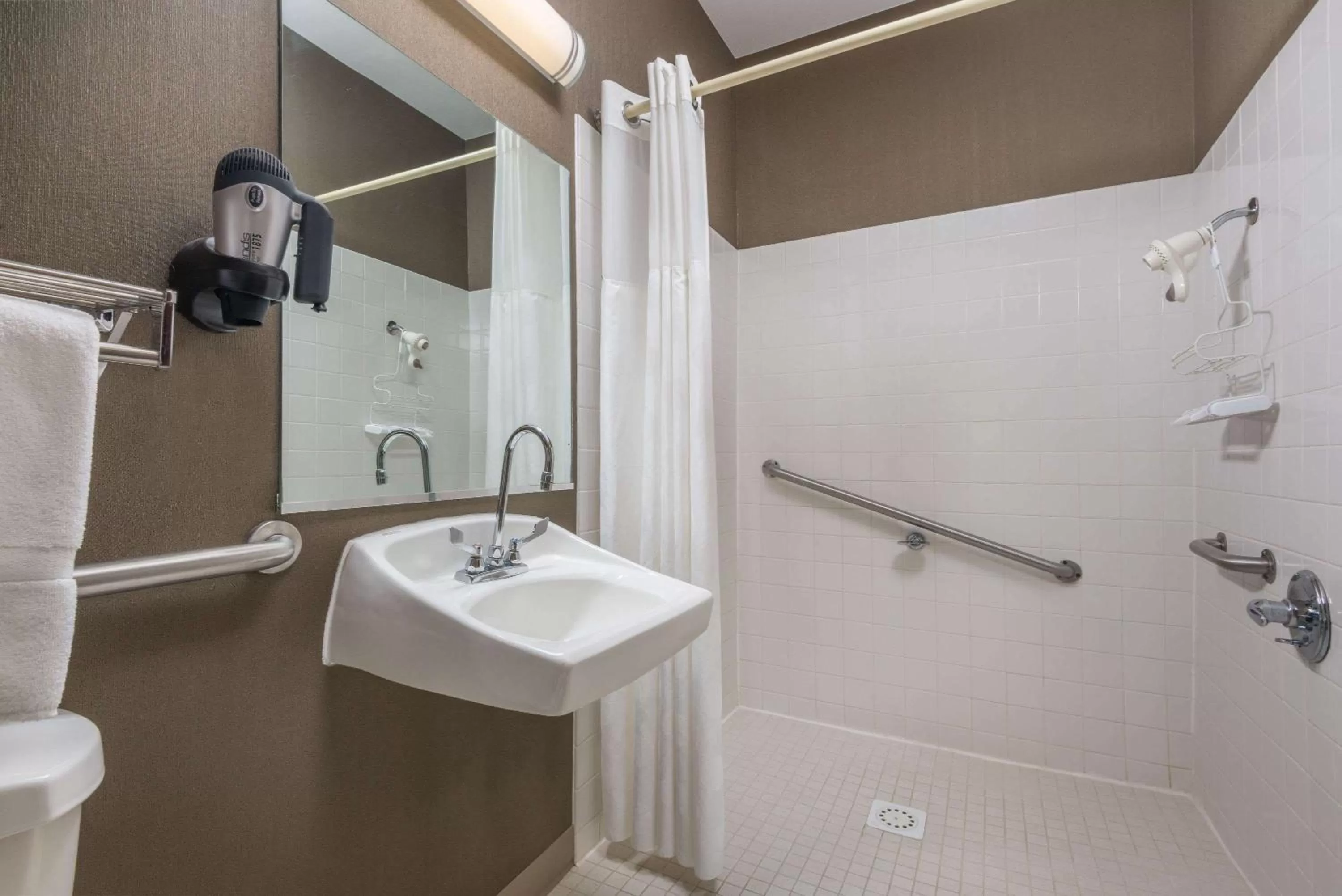 Bathroom in Ramada by Wyndham Catlettsburg Ashland
