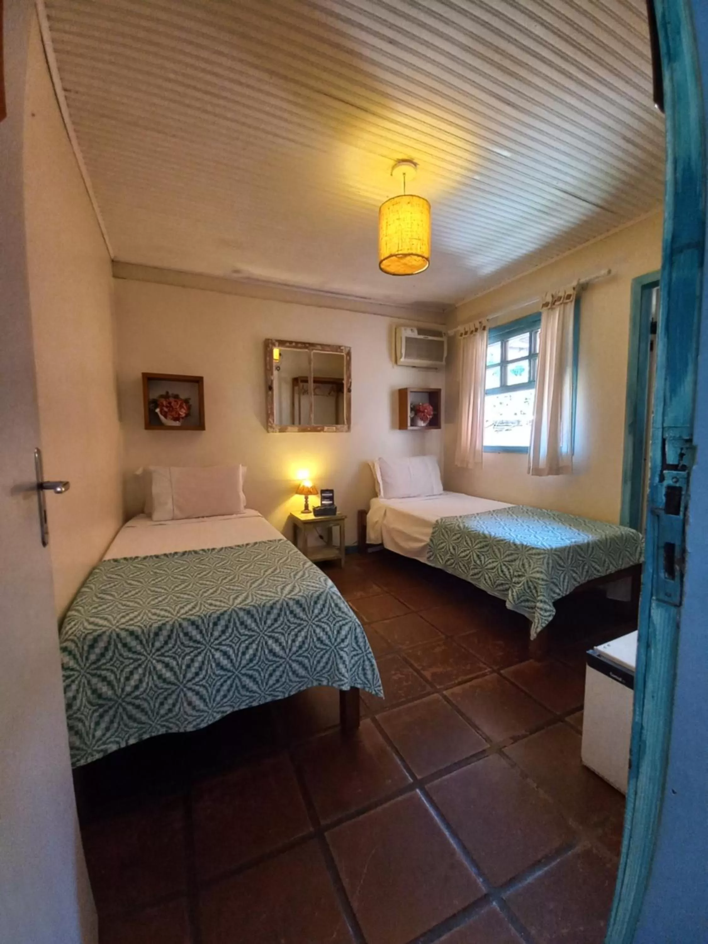 Bed in Pousada L'escale