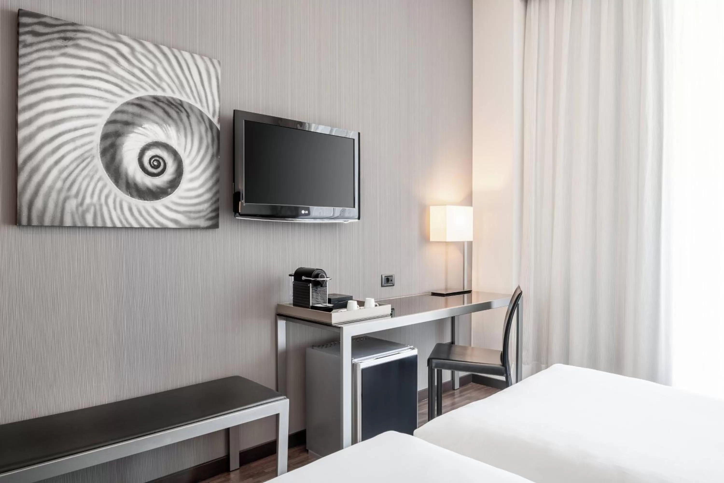 Photo of the whole room, Bed in AC Hotel Palacio Universal by Marriott