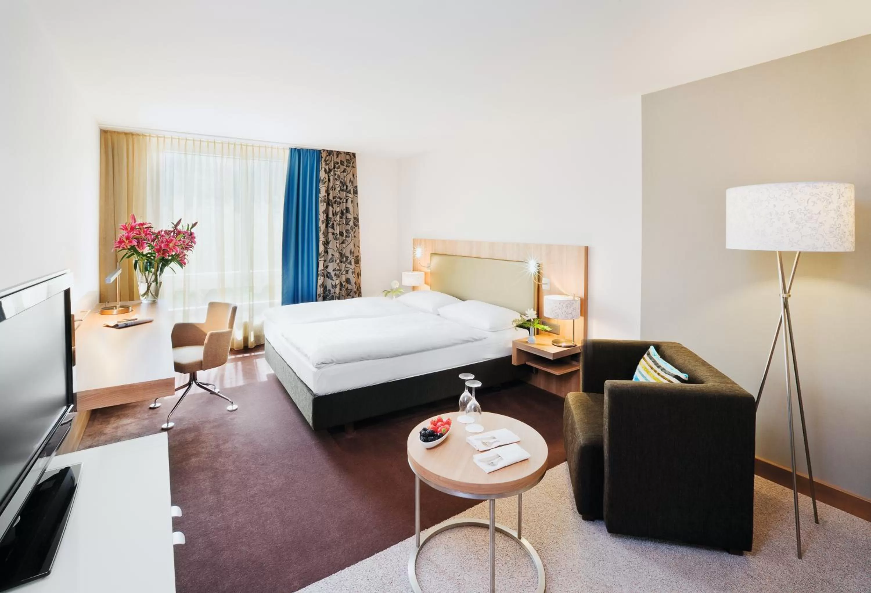 Photo of the whole room, Bed in Mövenpick Hotel Zürich-Regensdorf