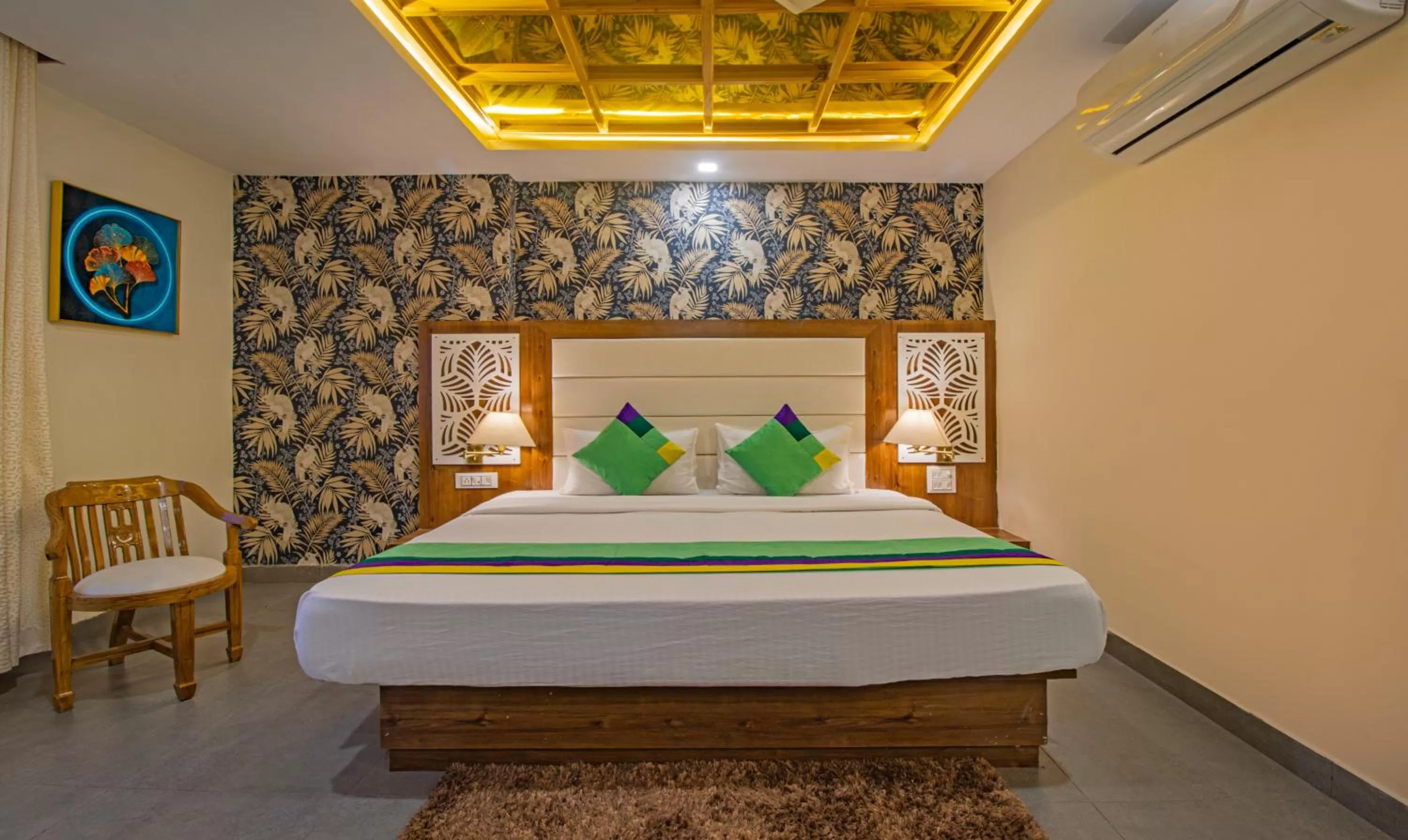 Bed in Treebo Trend Haveli Resort Roots Bhupatwala