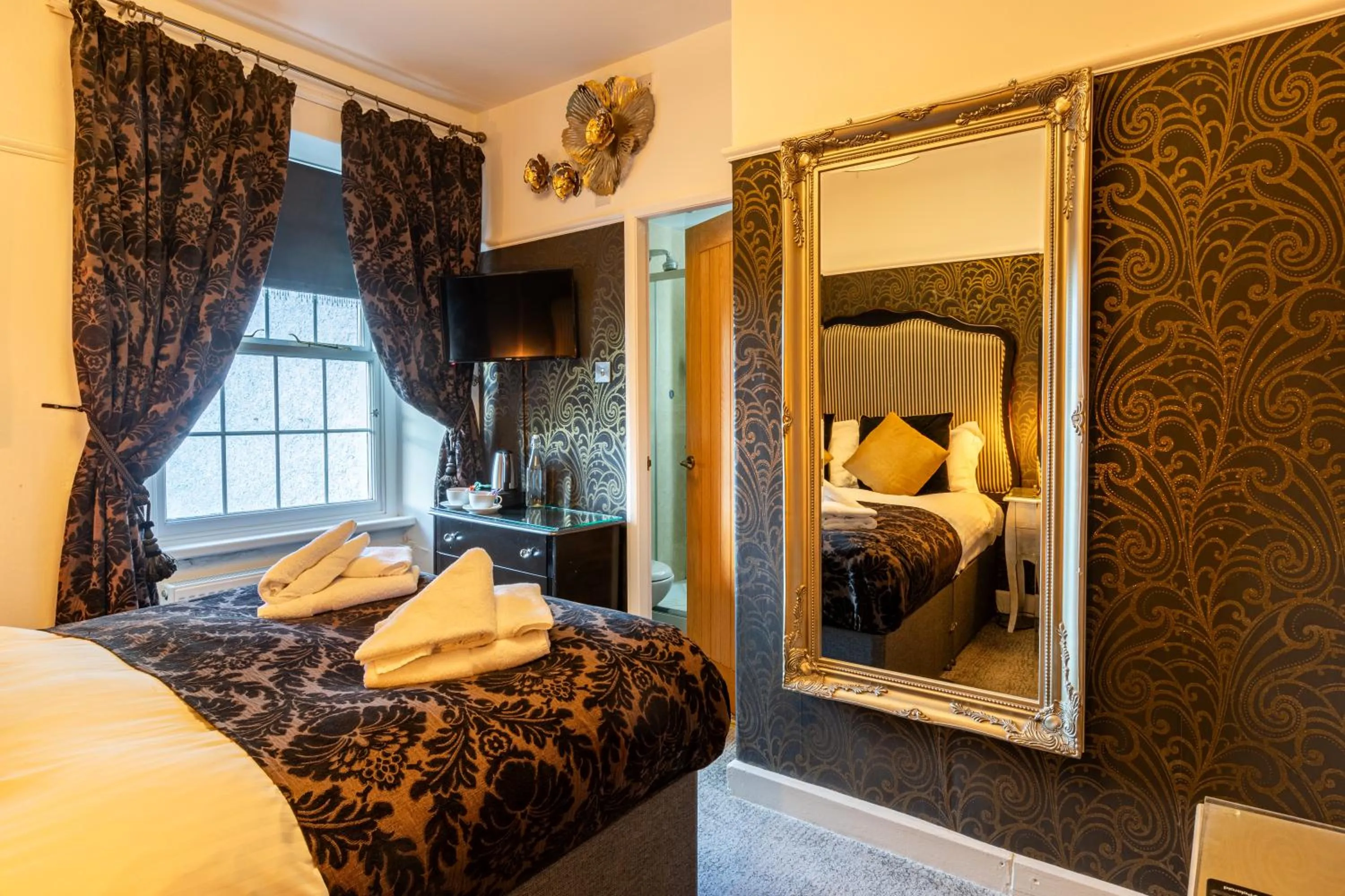 Bedroom, Bed in Holly Lodge Guest House with FREE off site health club