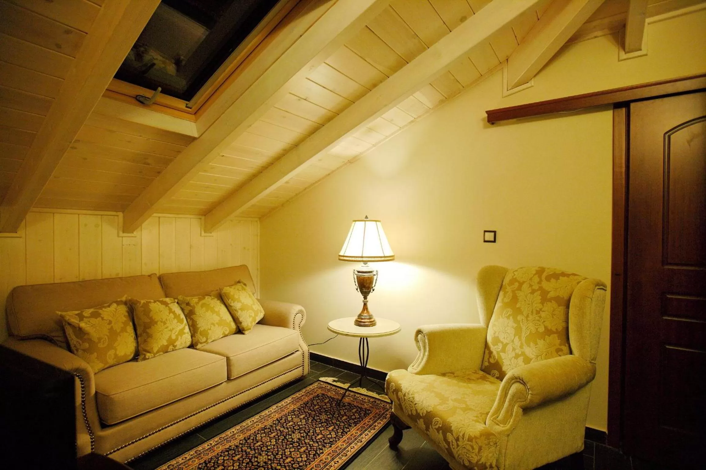 Seating area in Theofilos Paradise Boutique Hotel