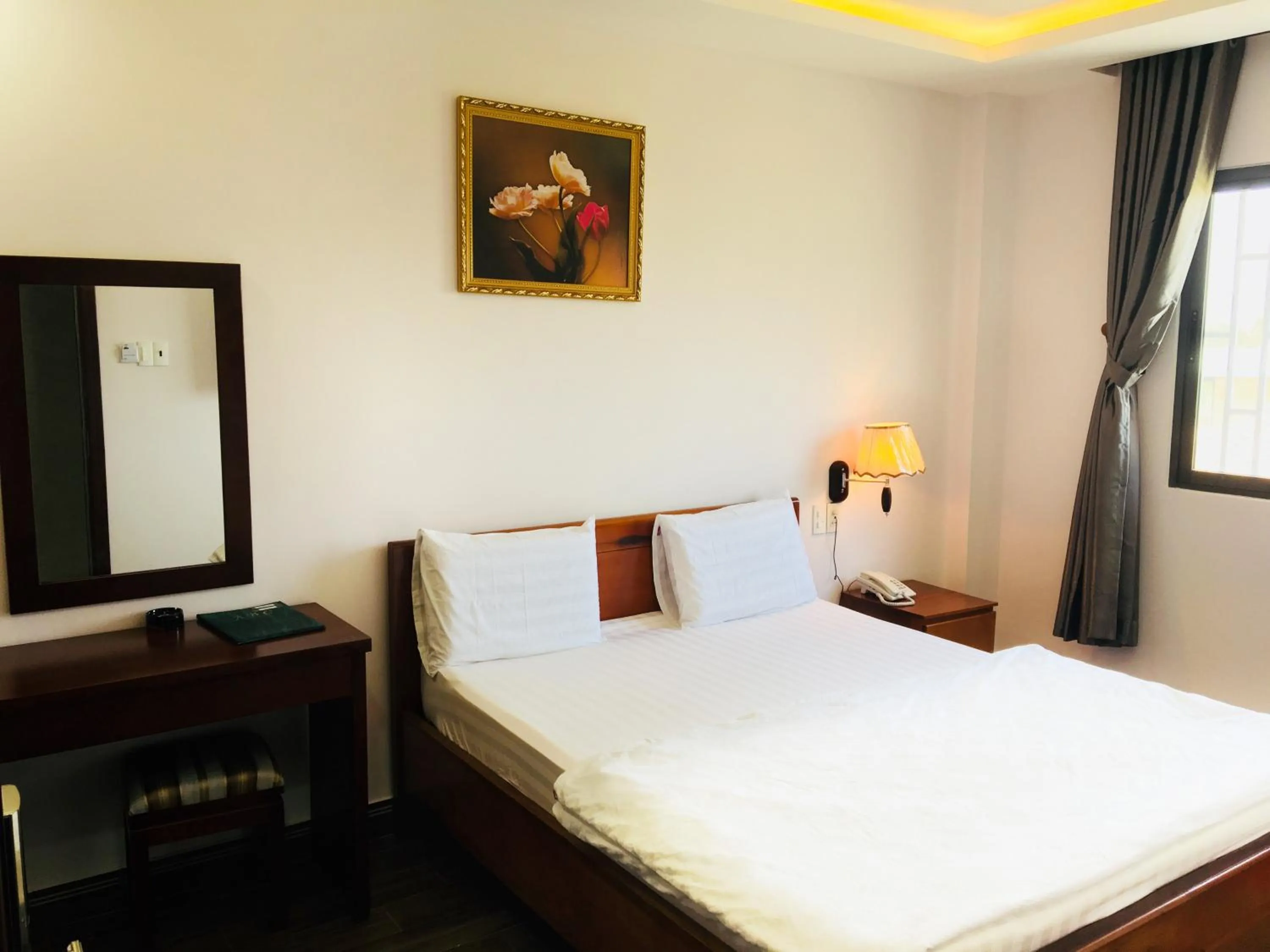 Bed in QUEEN VICTORIA Hotel