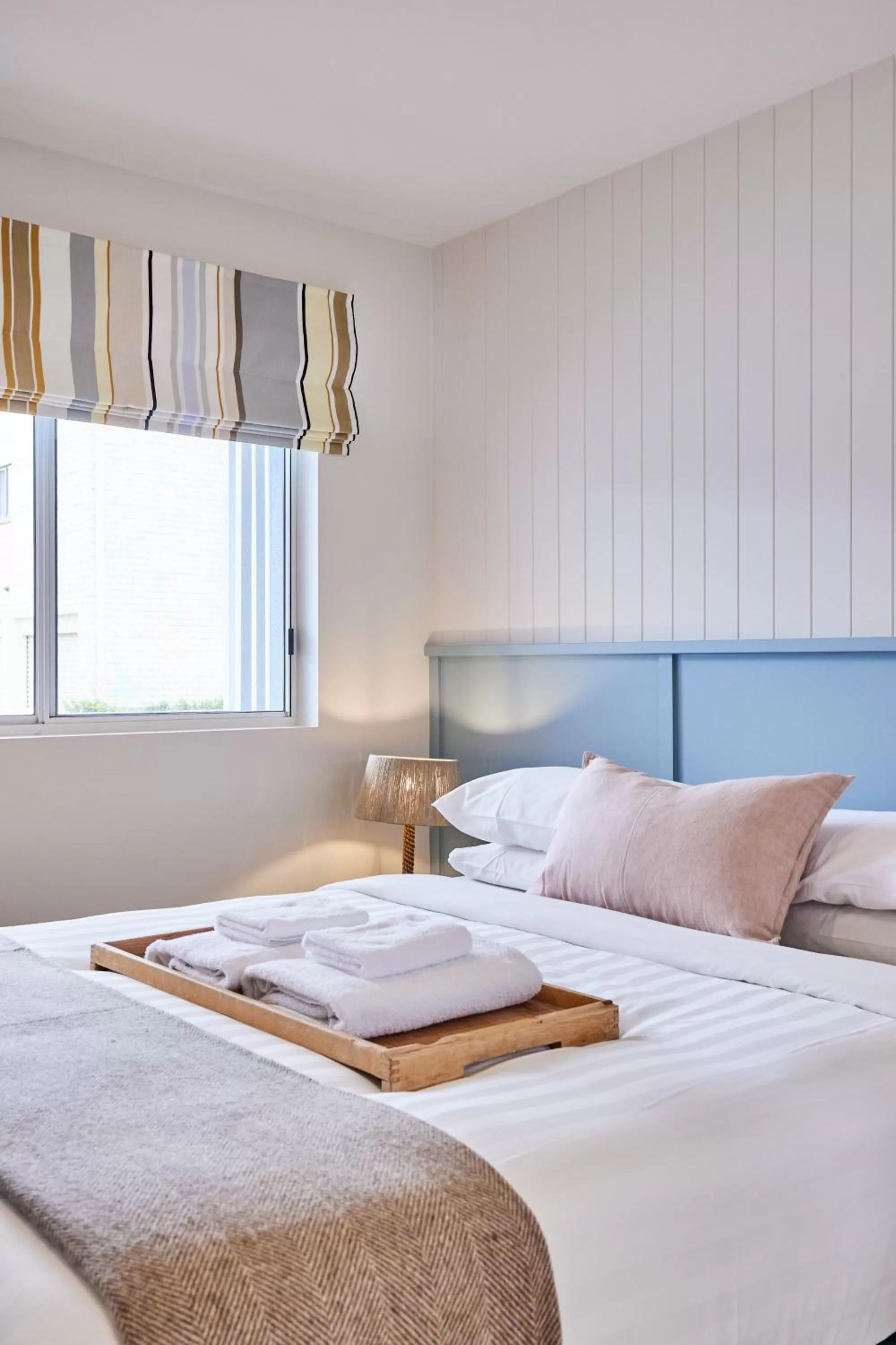 Bed in The Blue Water Motel