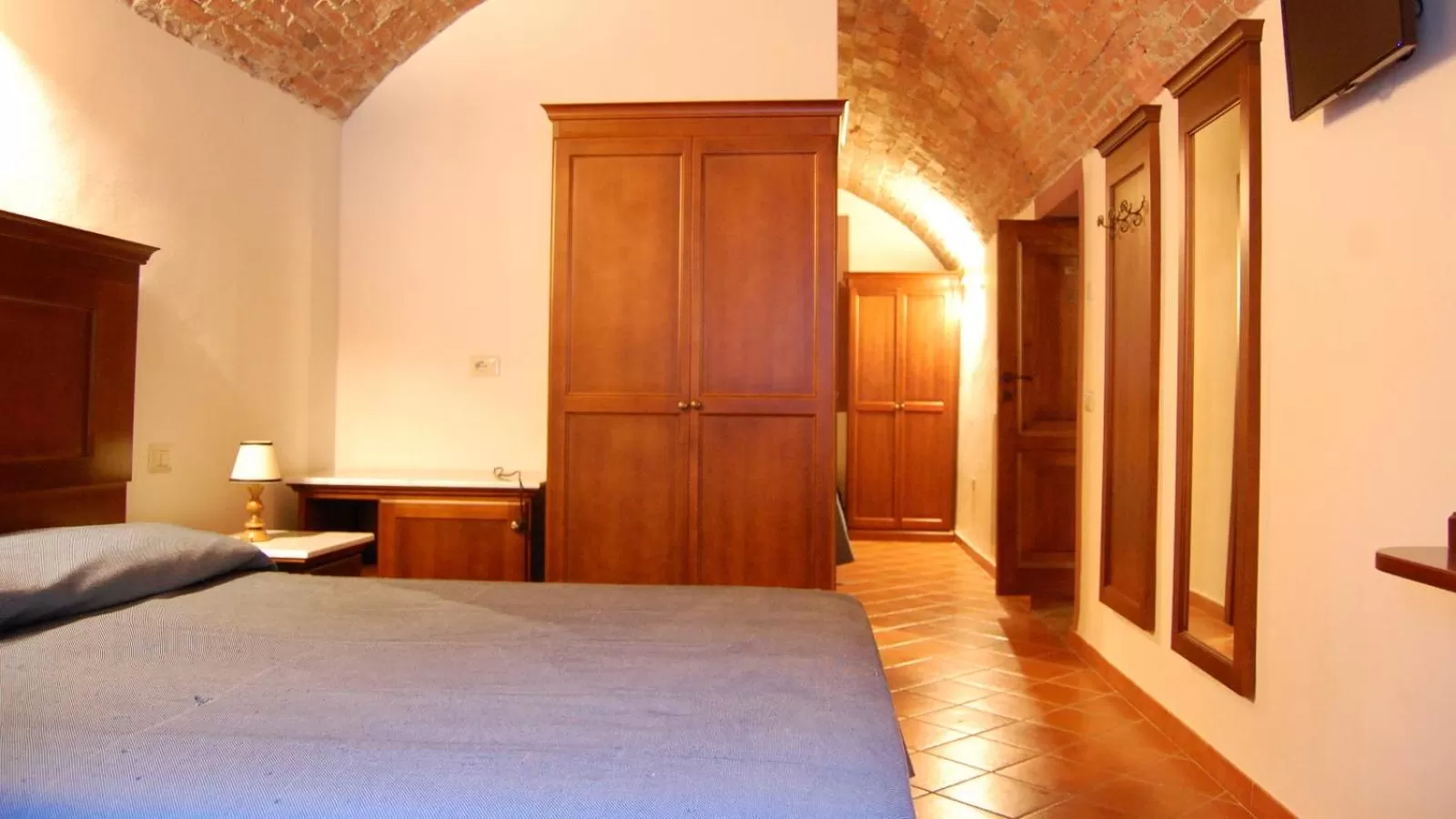 Bed in Albergo Miramonti