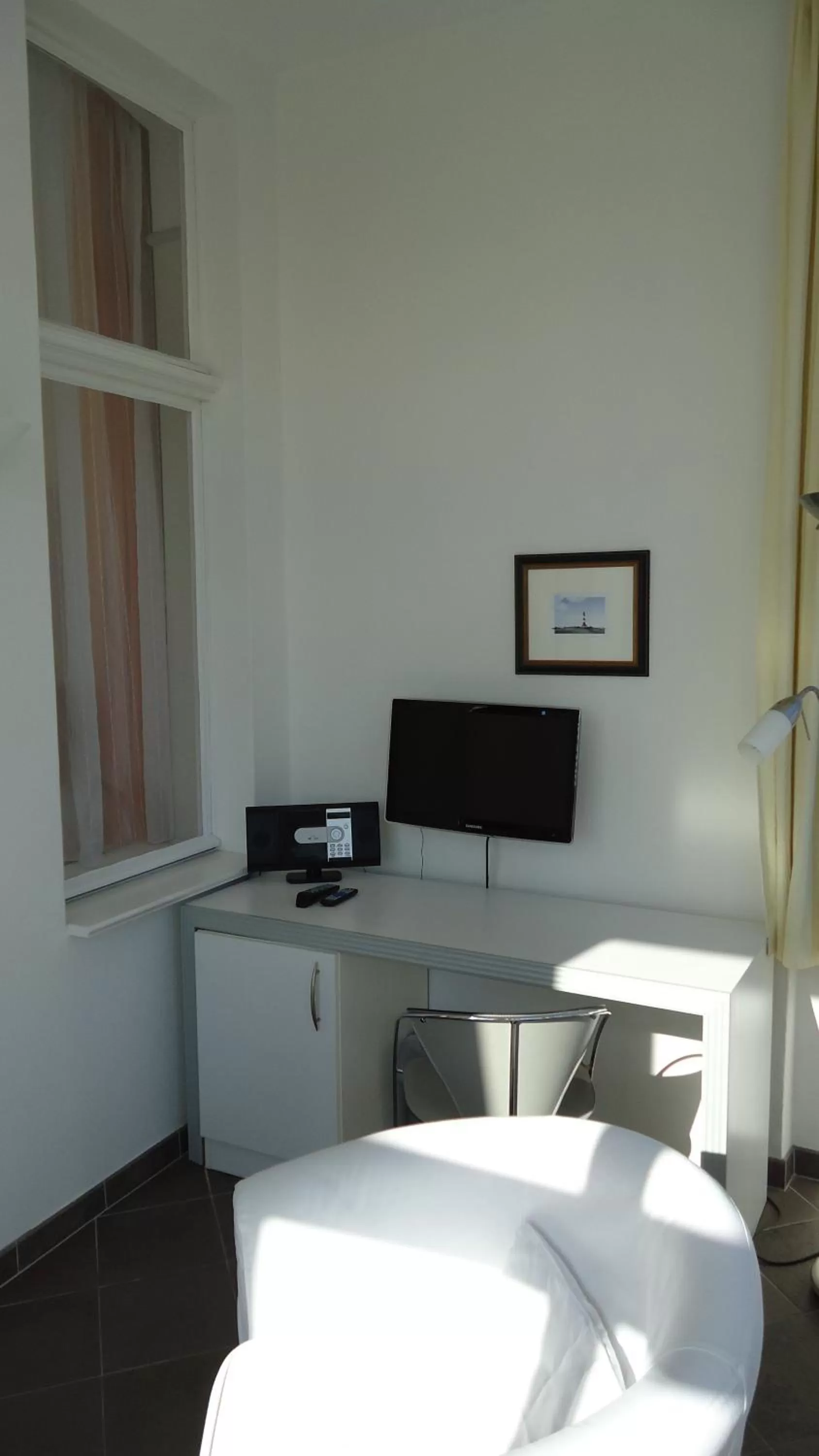 TV and multimedia, TV/Entertainment Center in Hotel Fortuna