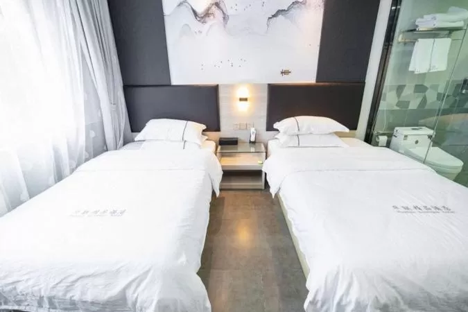 Bed in Shenzhen Hualian Boutique Hotel