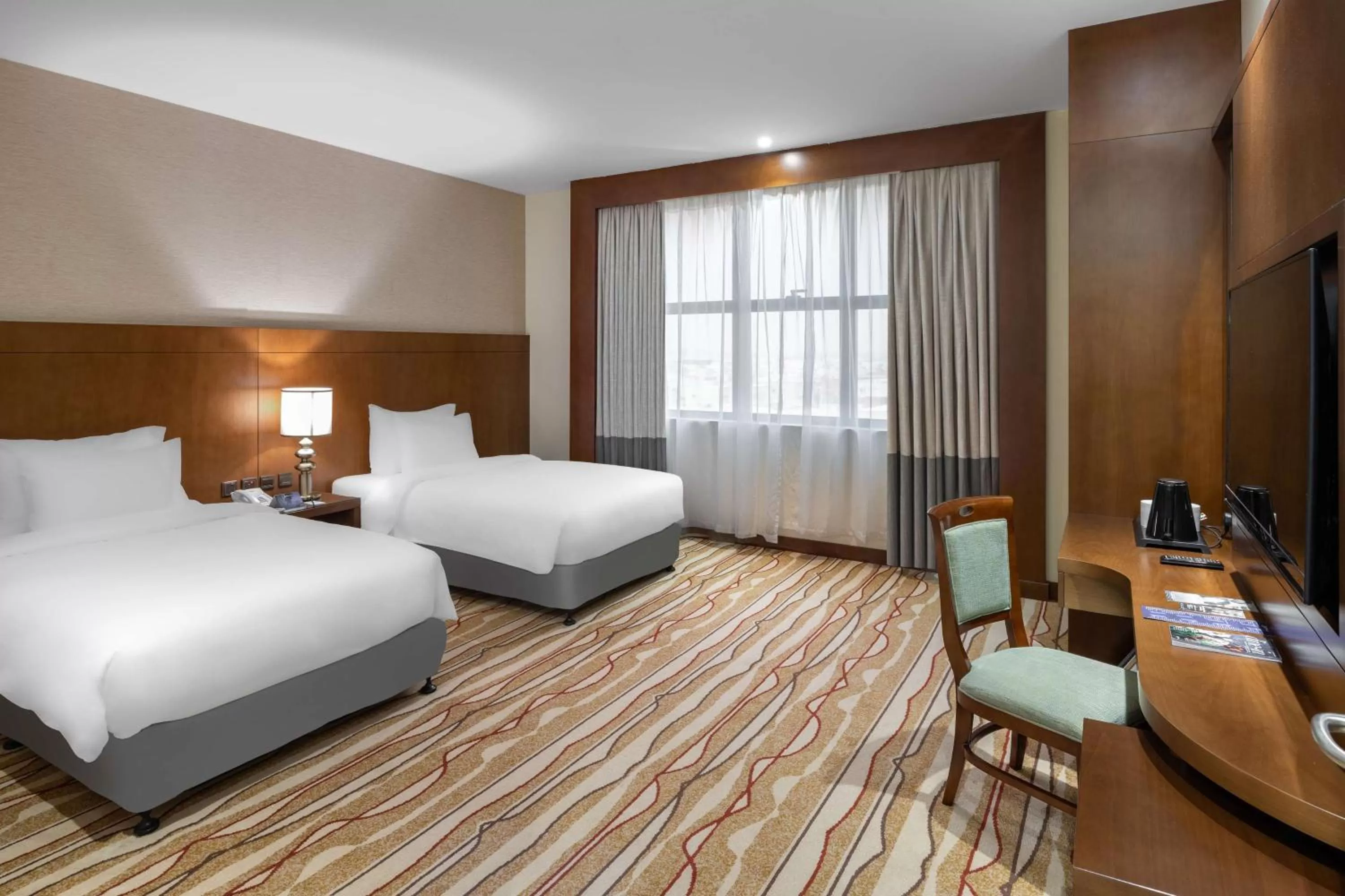 Photo of the whole room, Bed in Radisson Blu Hotel, Buraidah