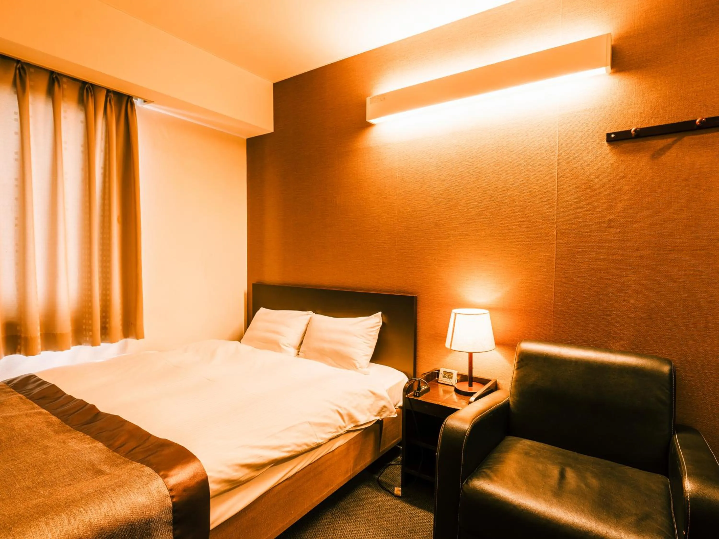 Photo of the whole room, Bed in Hotel AreaOne Takamatsu