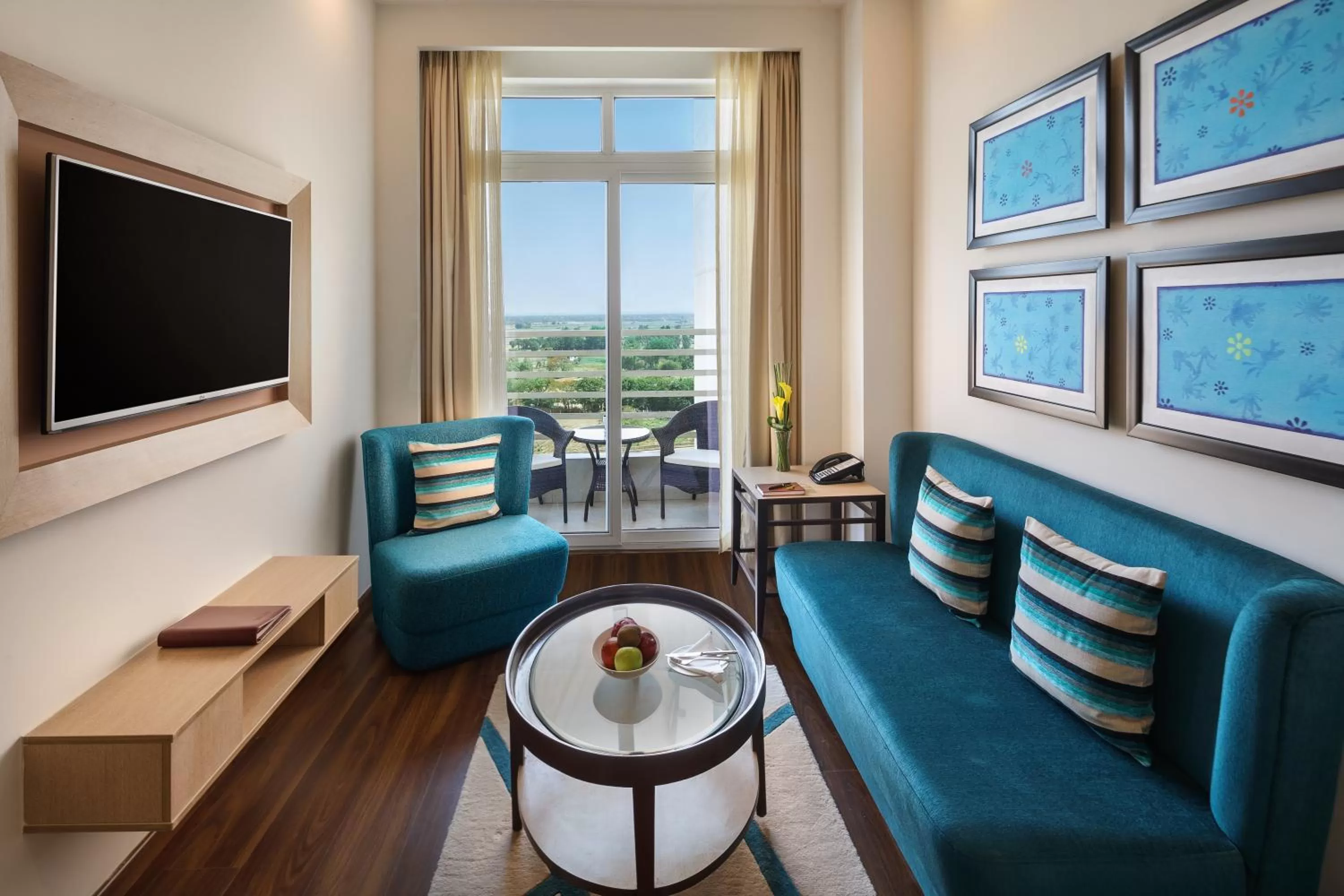 Living room in Sandal Suites by Lemon Tree Hotels