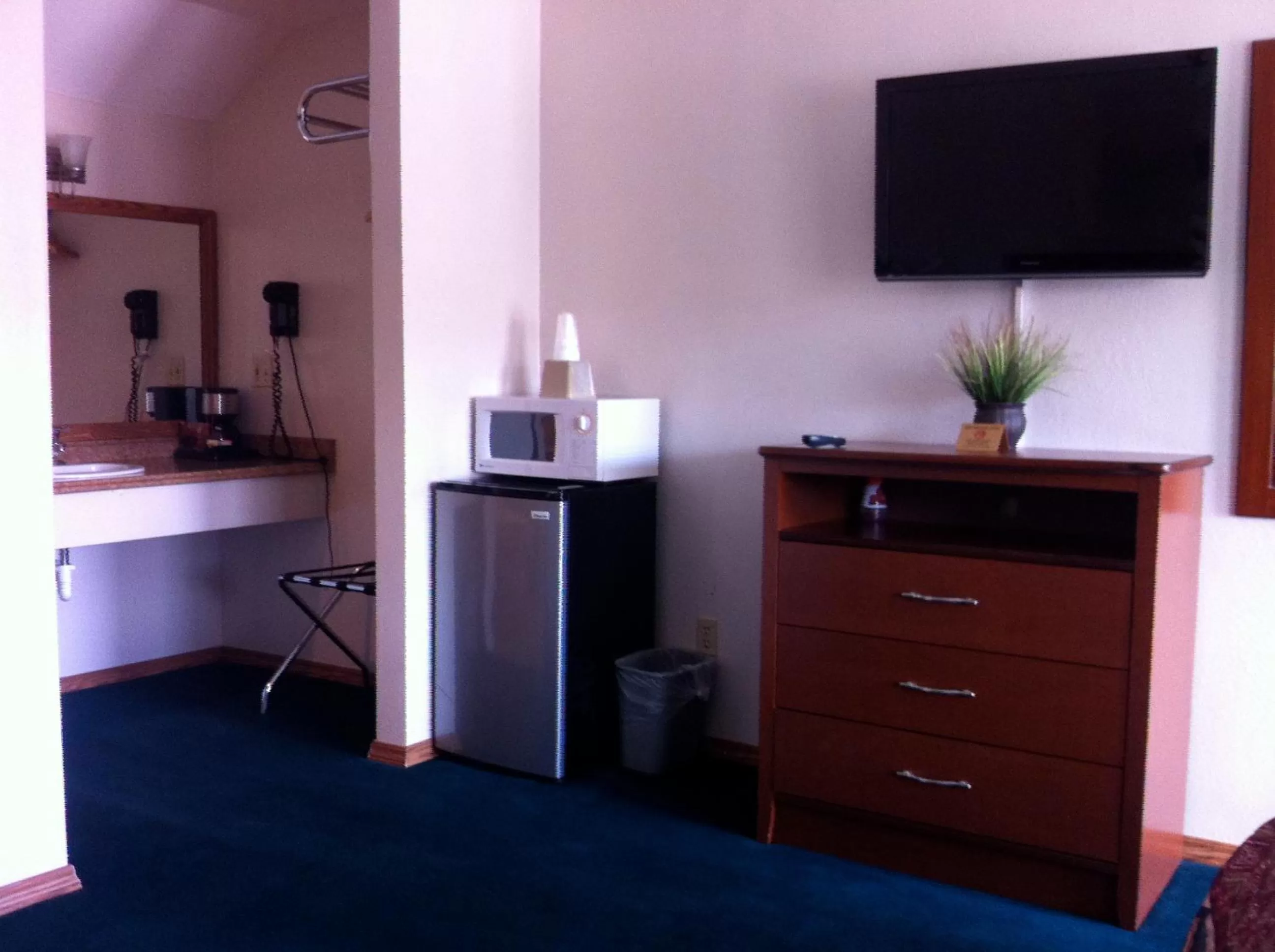 Decorative detail, TV/Entertainment Center in Legacy Inn