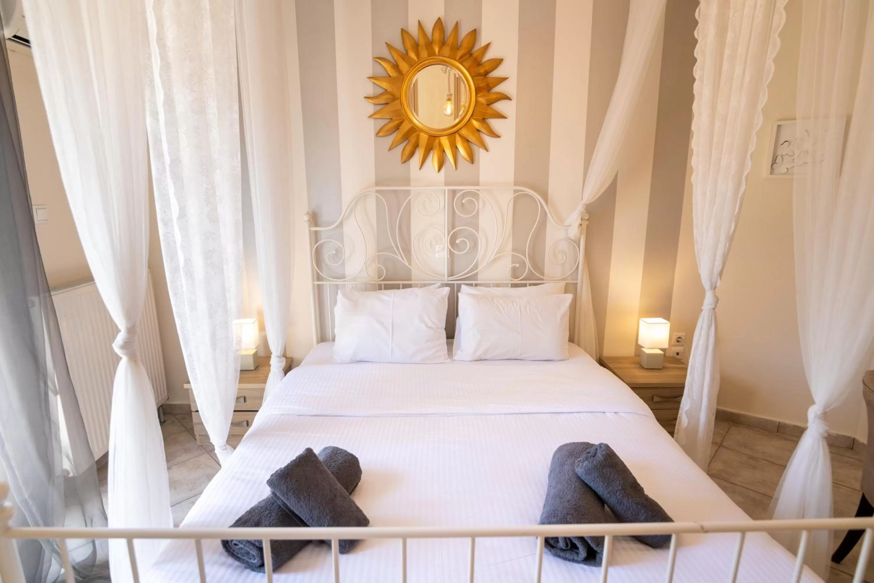 Bed in Votsalakia Hotel & Luxury Apartments