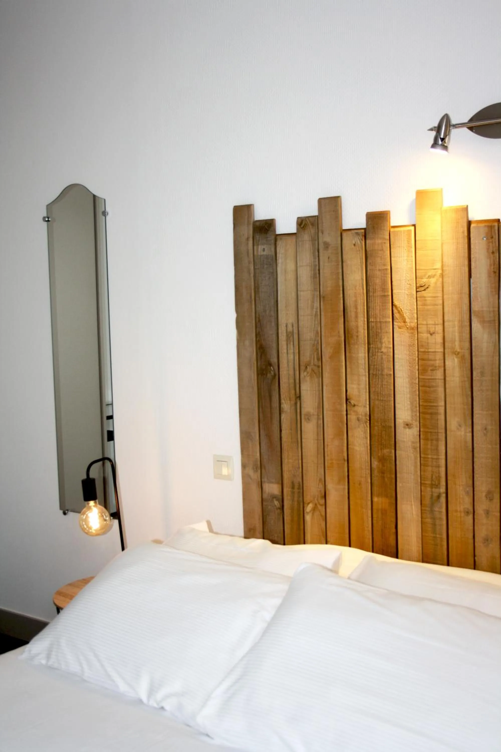 Bed in Logis Hôtel Sea View