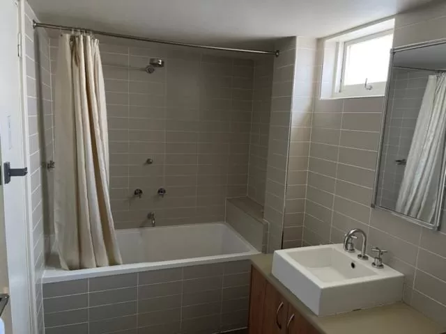 Bathroom in The Astor Hotel Motel