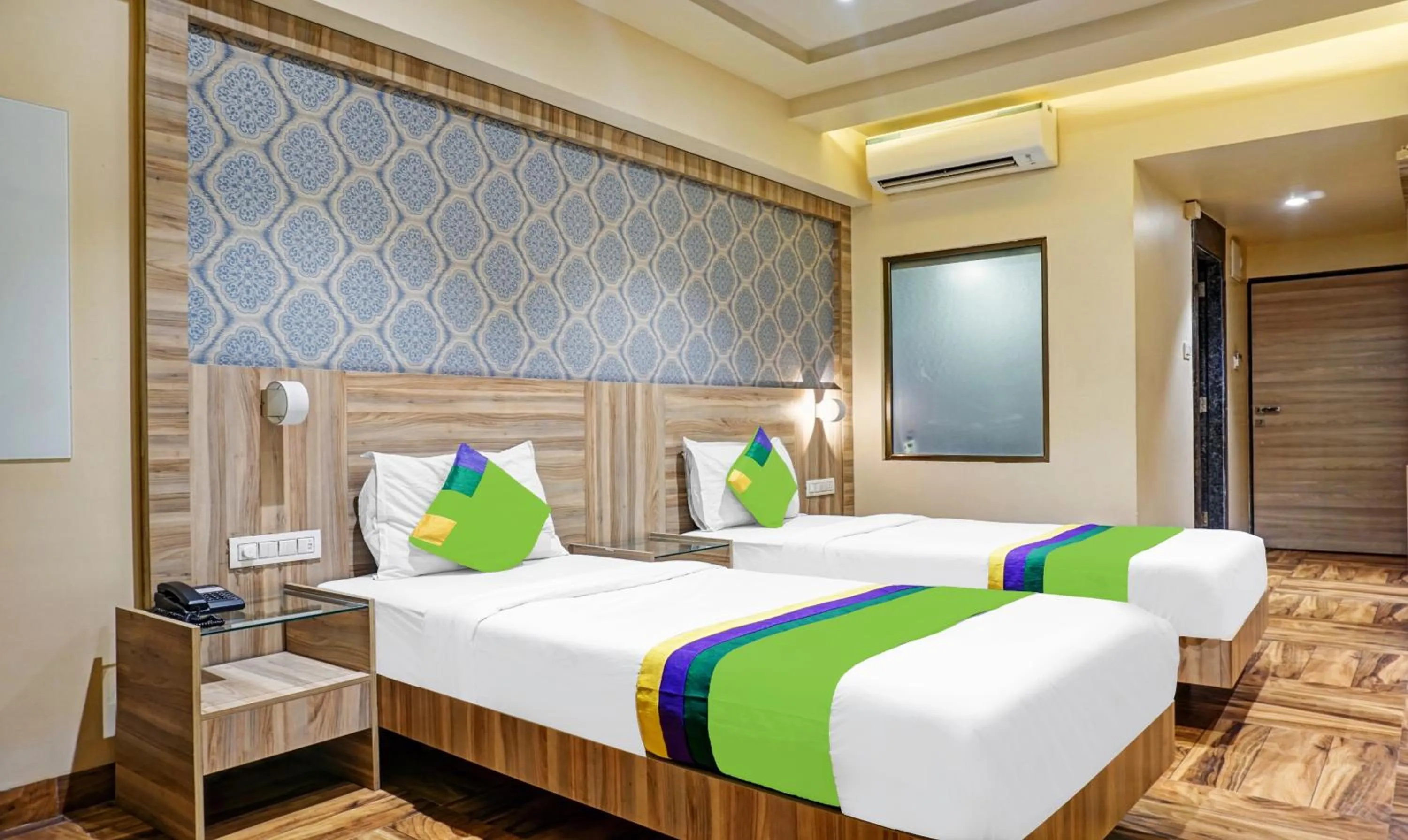 Bedroom, Bed in Treebo Classic Grande, Camp