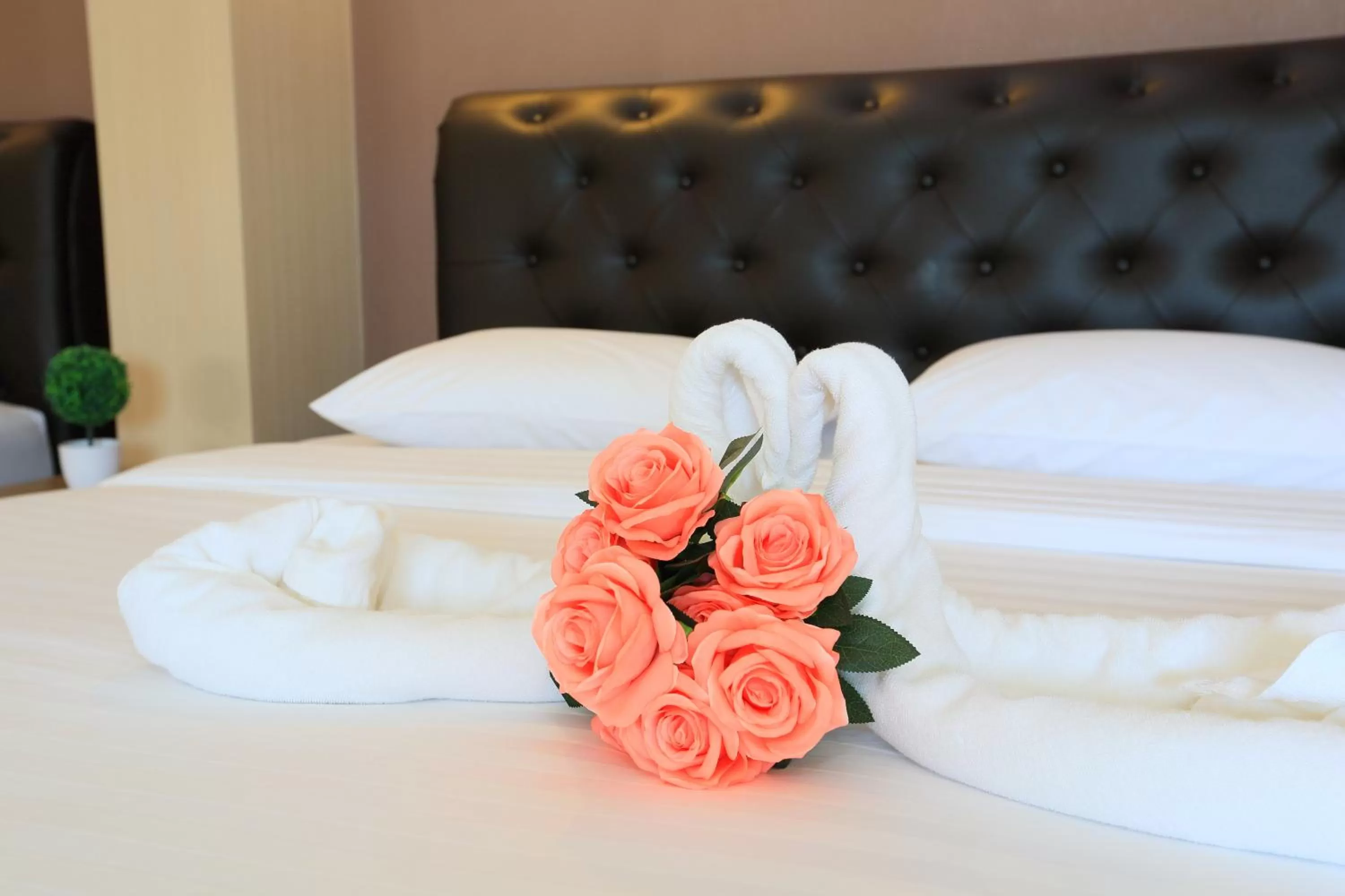 Bed in Triple Trees Hotel