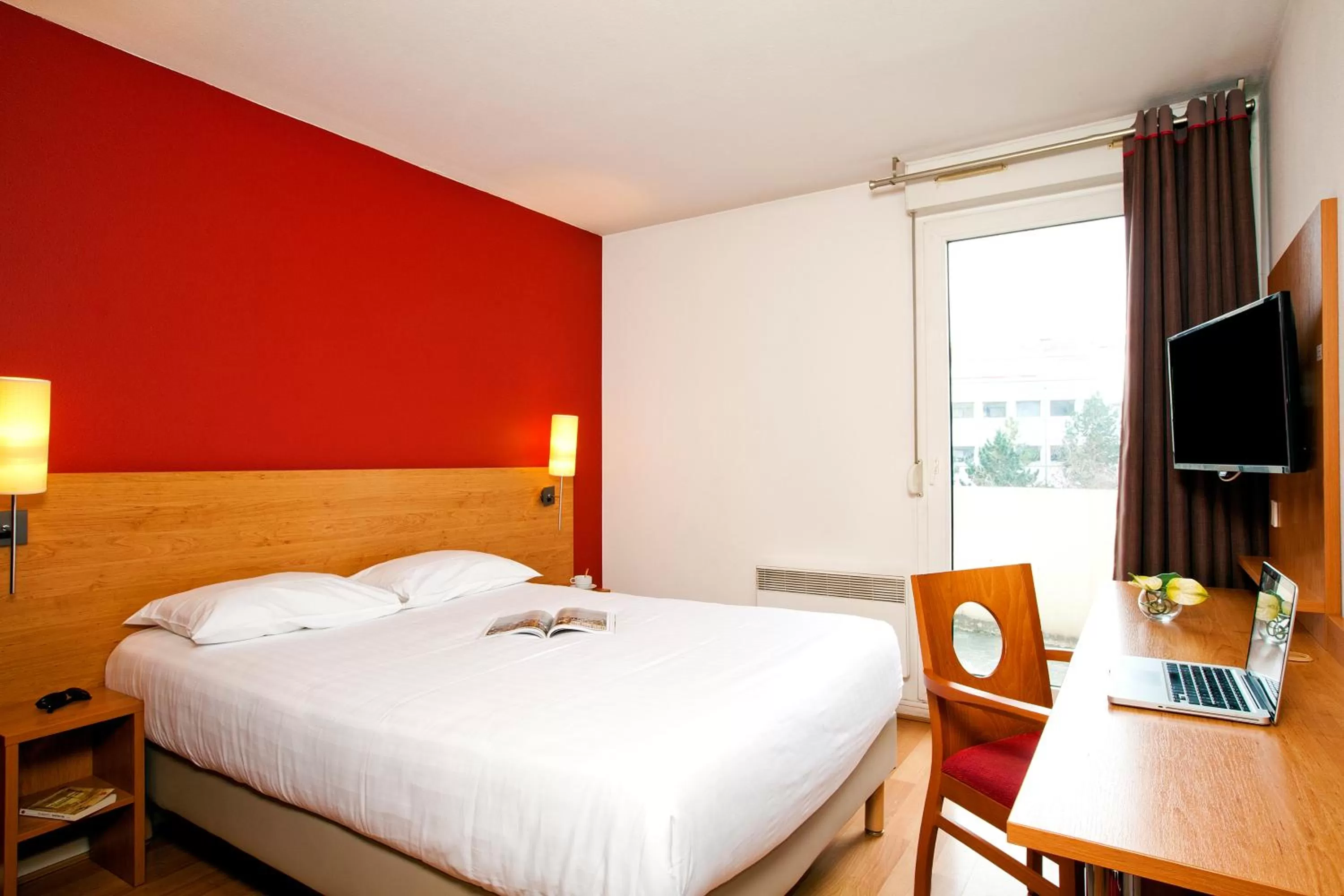 Bedroom, Bed in Séjours & Affaires Lyon Saxe-Gambetta