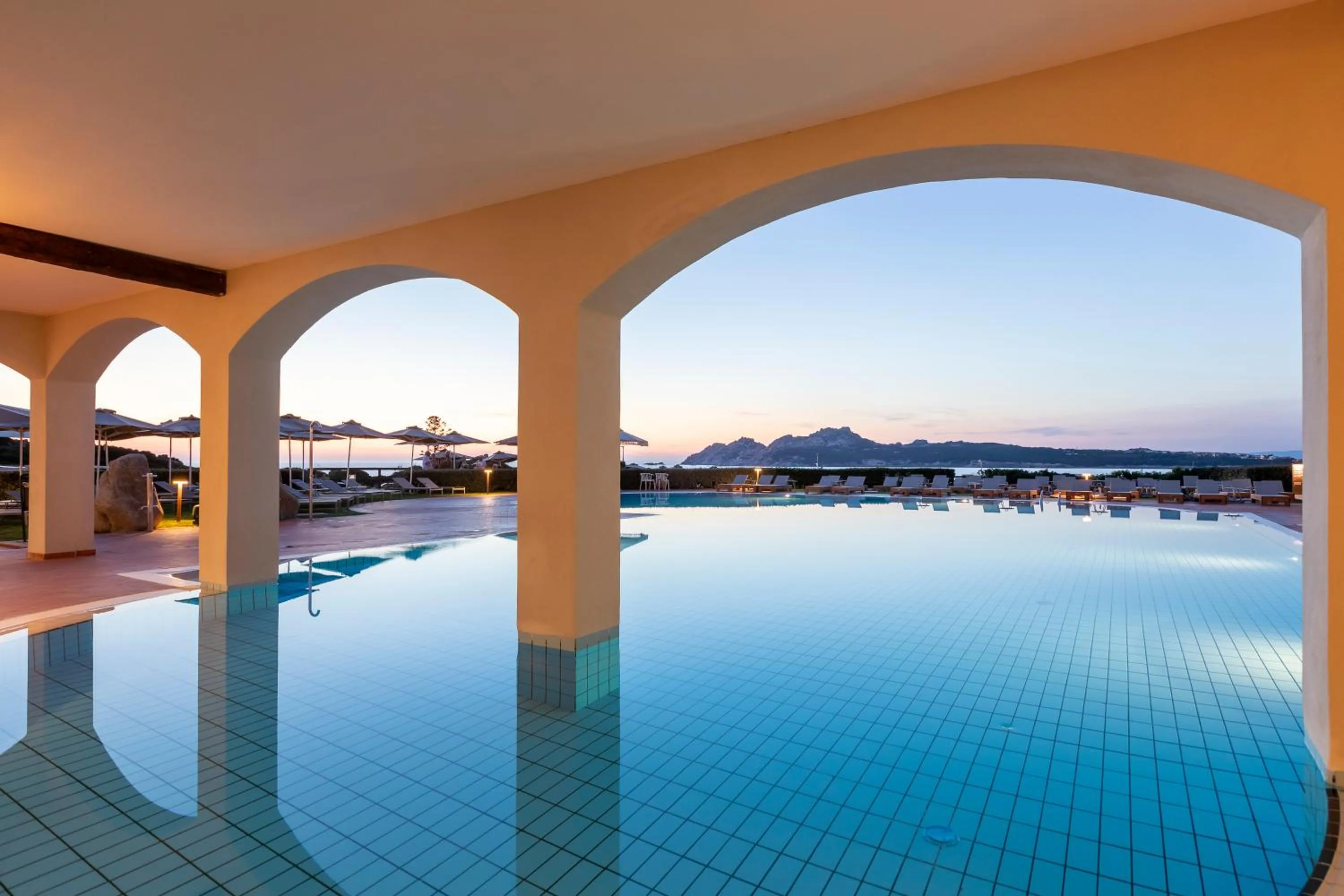 Swimming pool in Mangia's Santa Teresa Sardinia, Curio Collection by Hilton