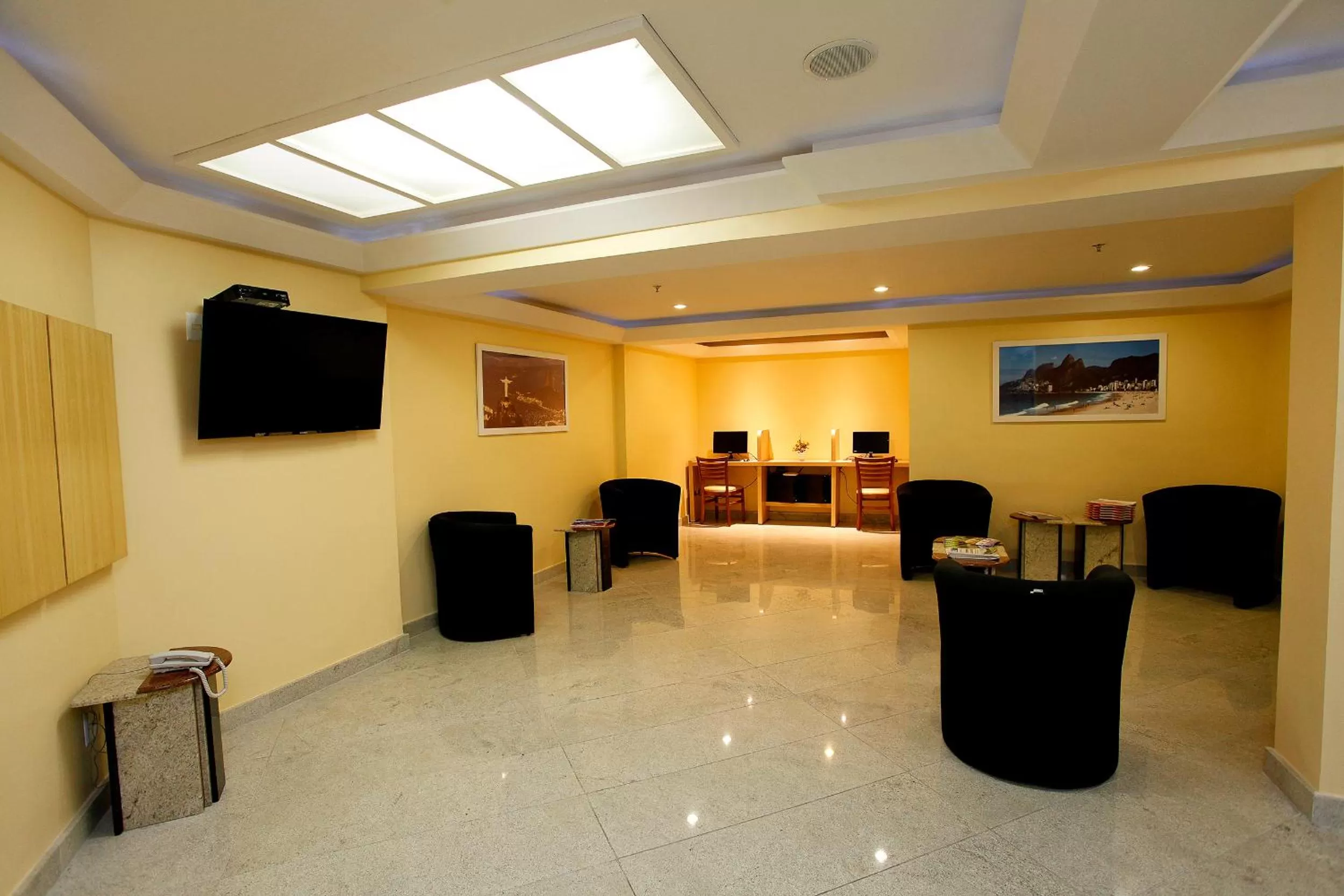 Lobby or reception in Elegance Praia Hotel