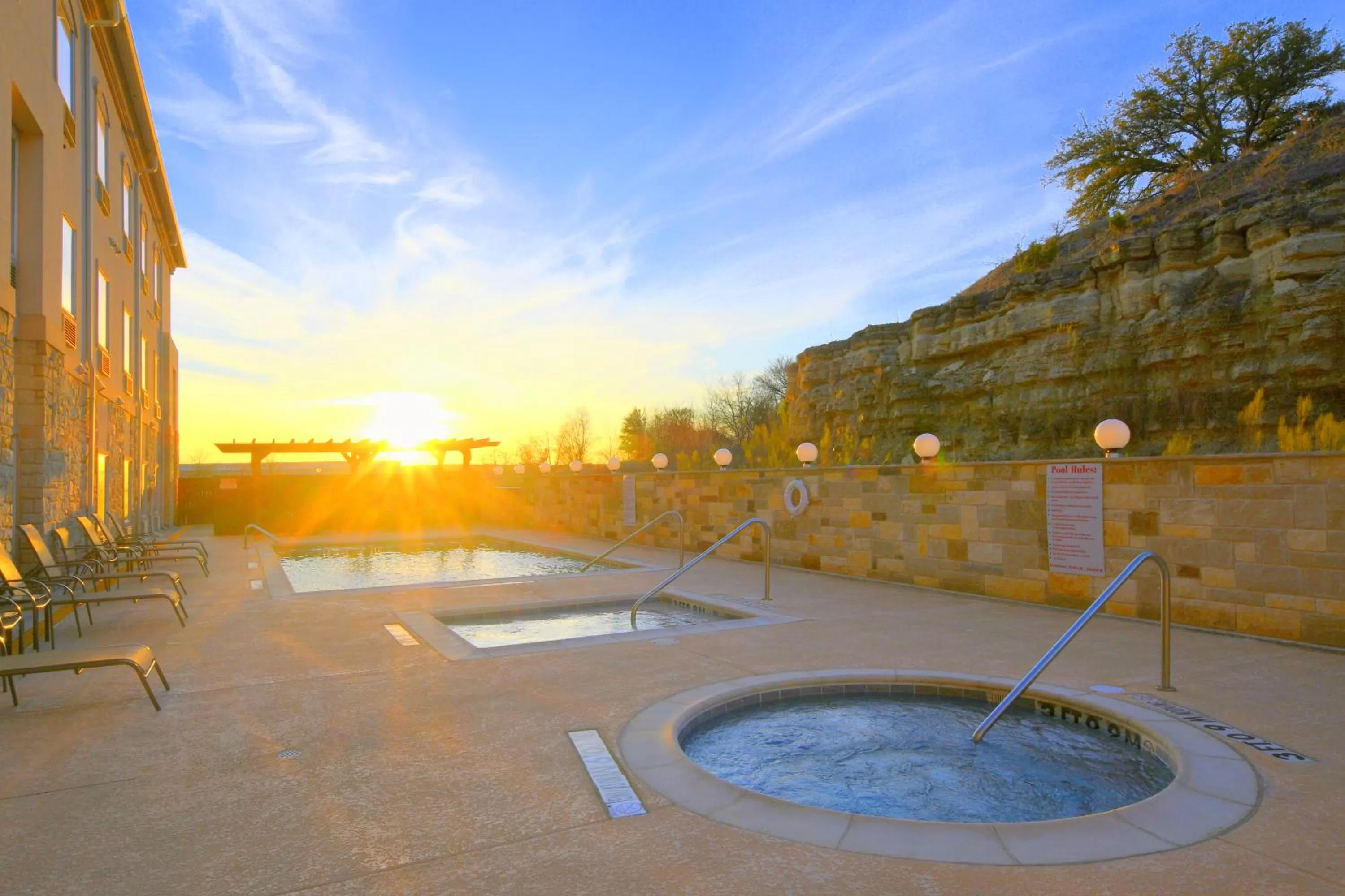 Swimming pool in Baymont Inn & Suites by Wyndham Glen Rose