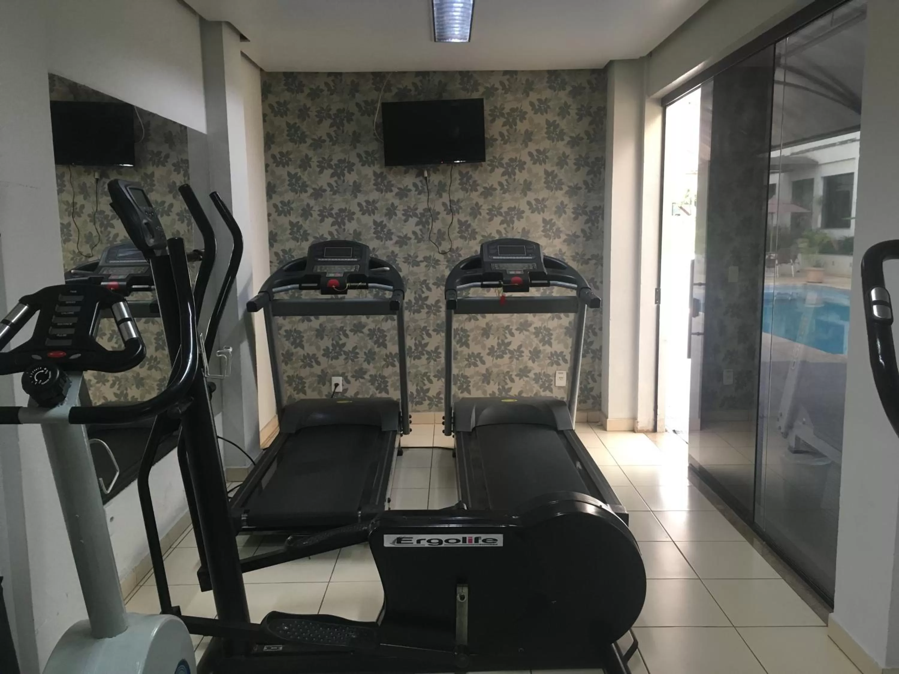 Fitness centre/facilities in Atrium Confort Hotels