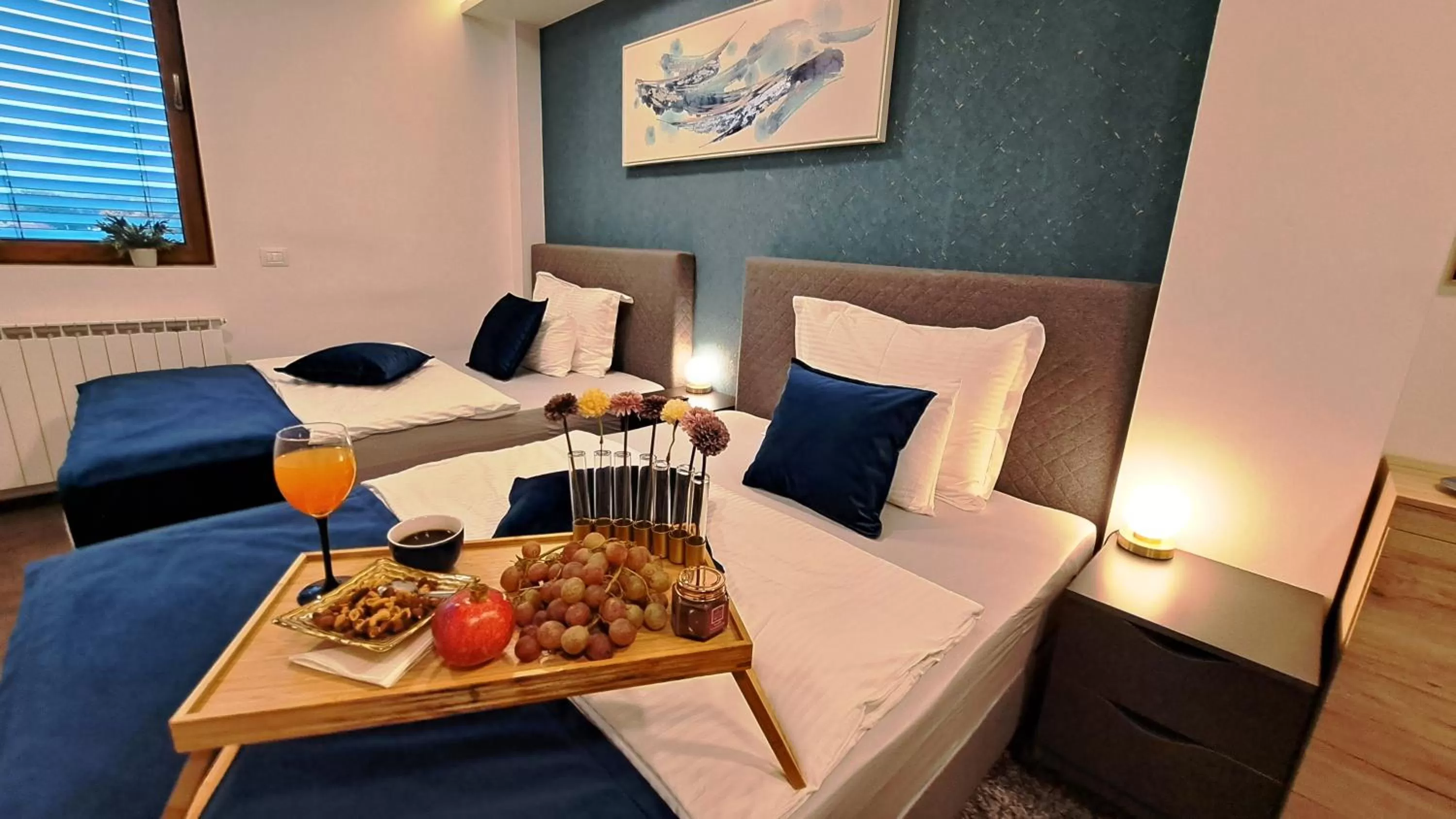 Bed in Arcobaleno Apartments & Rooms