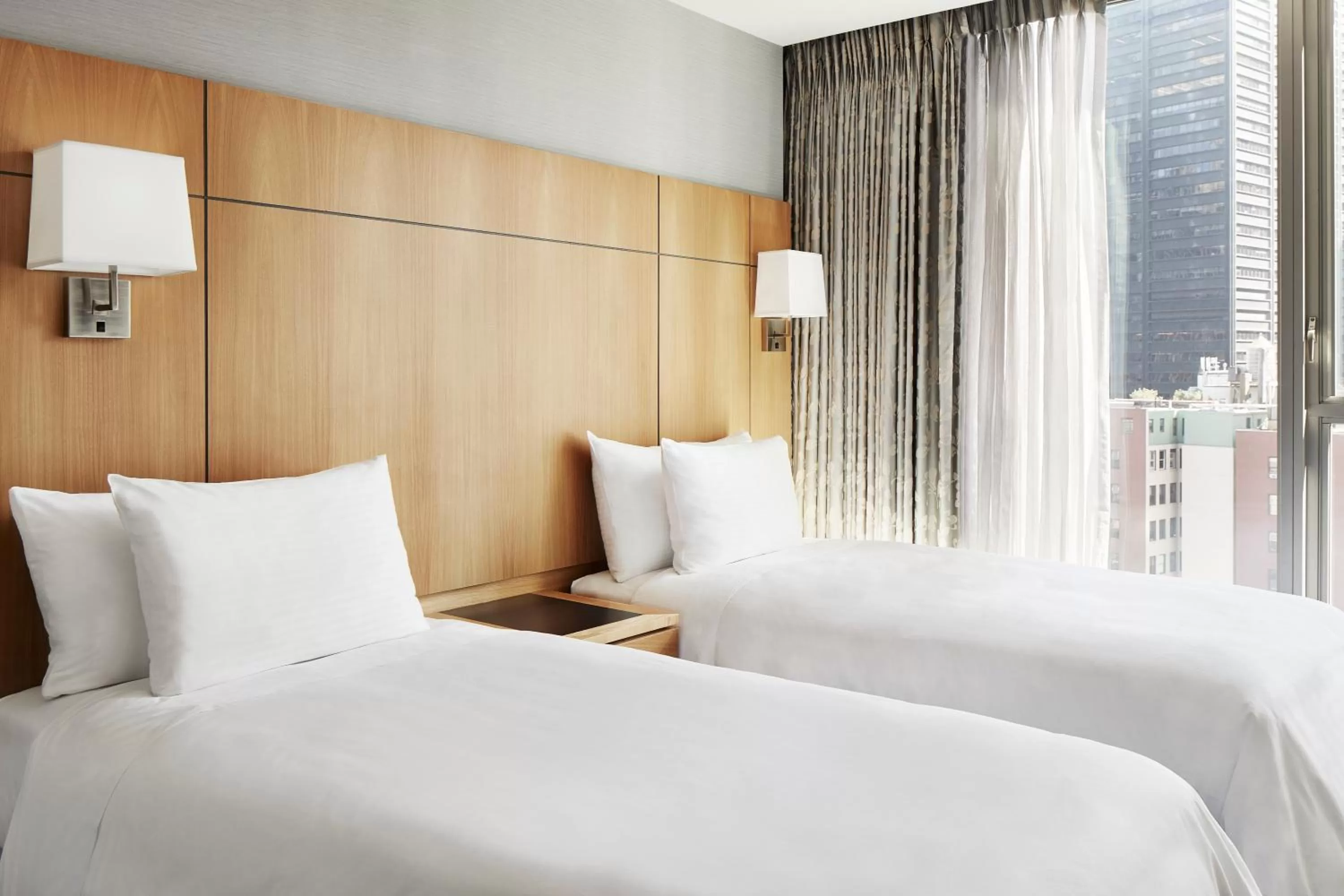 Bed in Club Quarters Hotel World Trade Center, New York