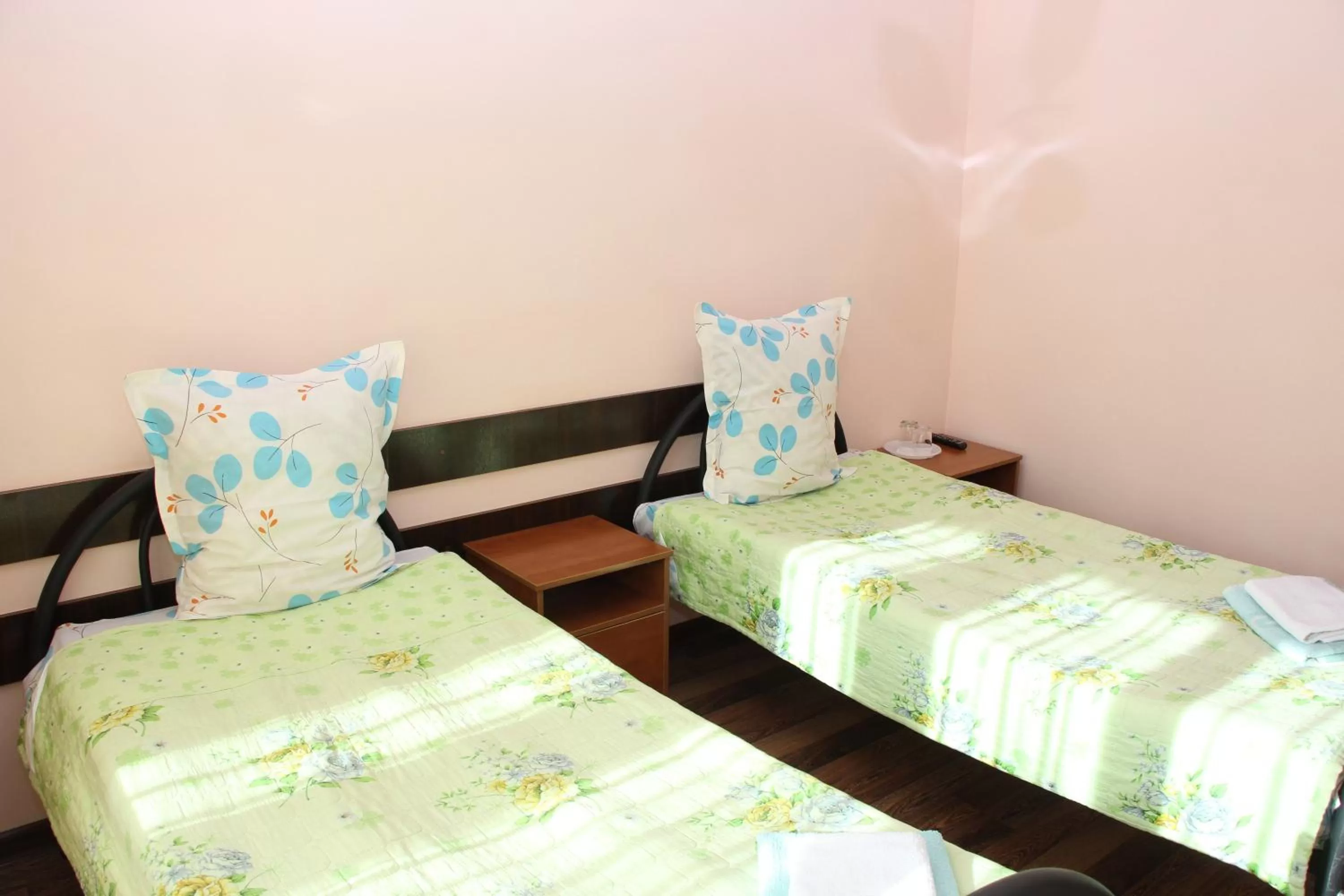 Bed in Zhaylau Hotel