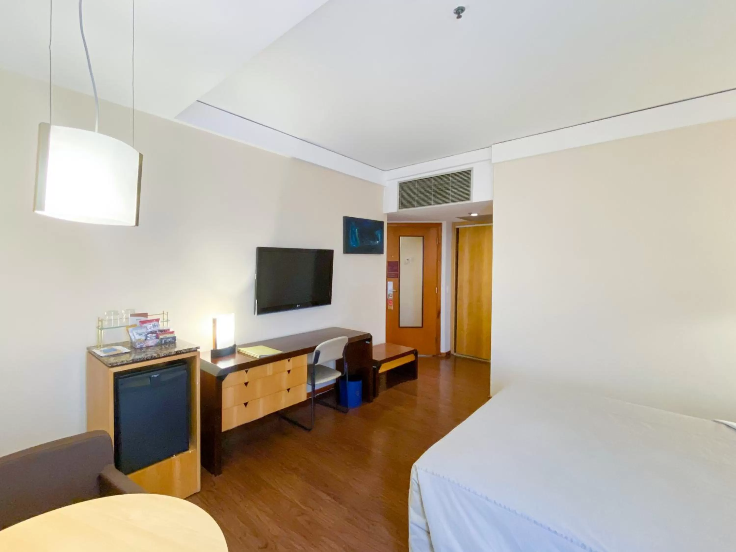 Bed in Golden Tower Pinheiros by Fênix Hotéis