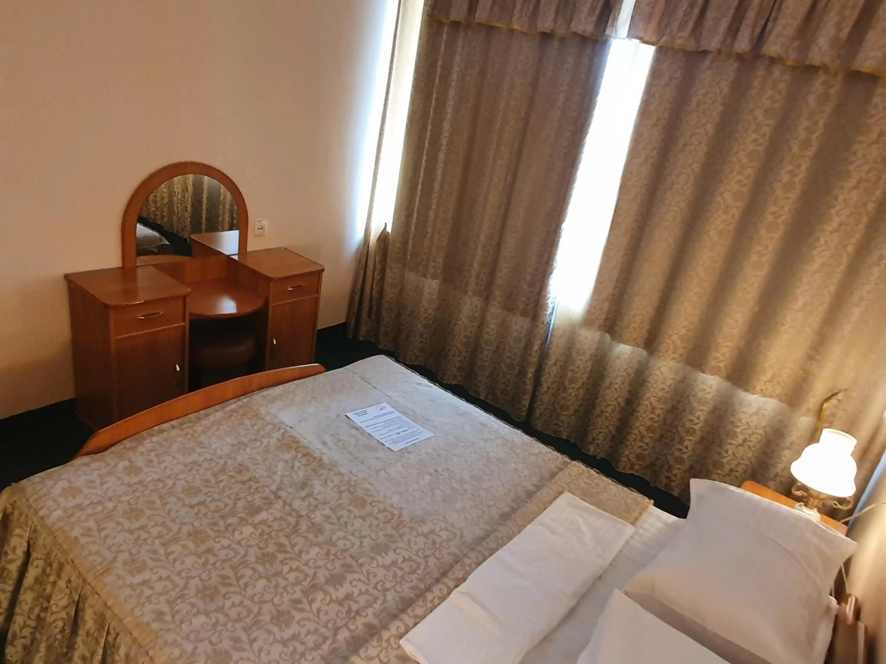 Bed in Aktobe Hotel