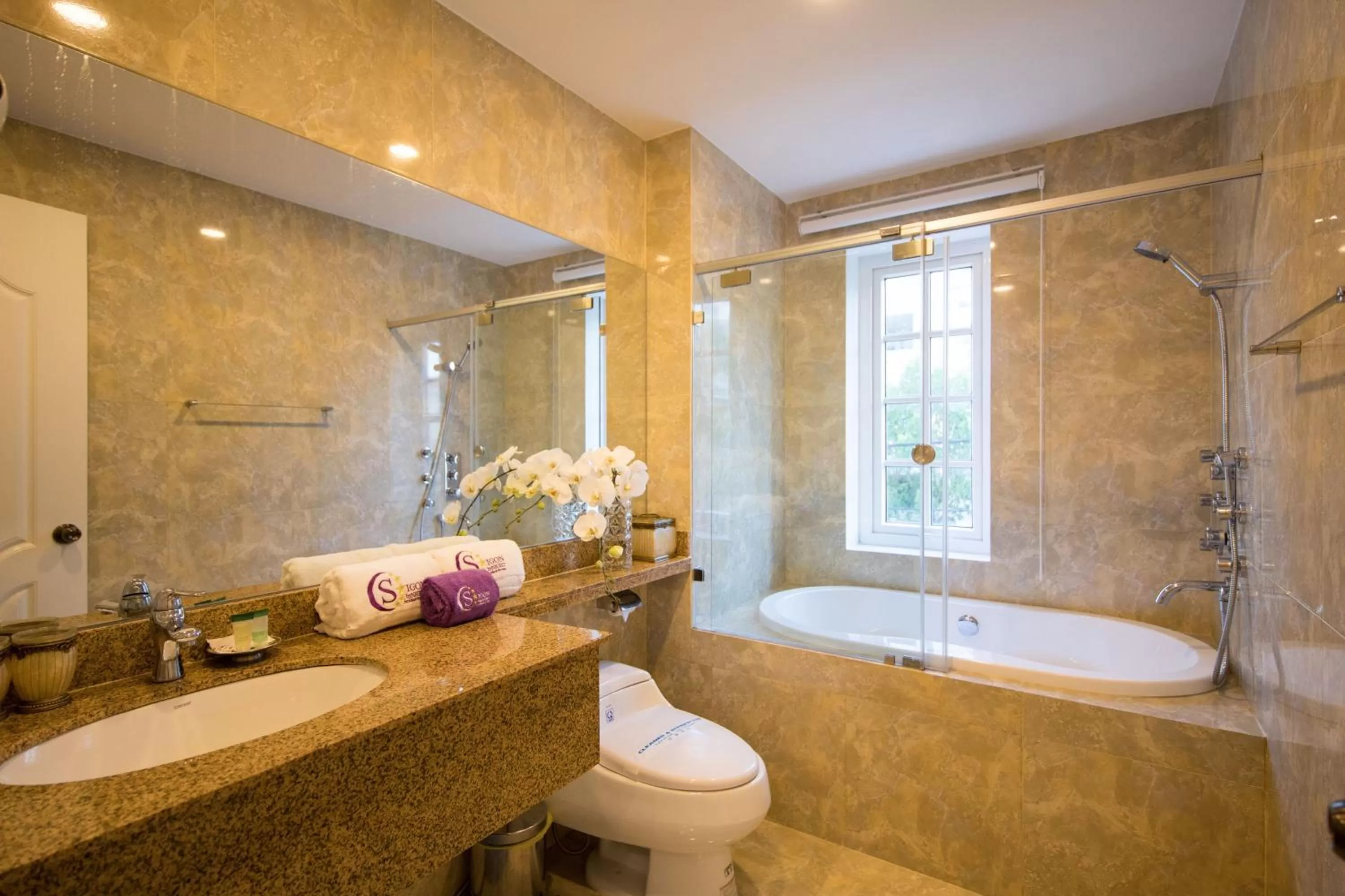 Bathroom in Saigon By Night Luxury Hotel