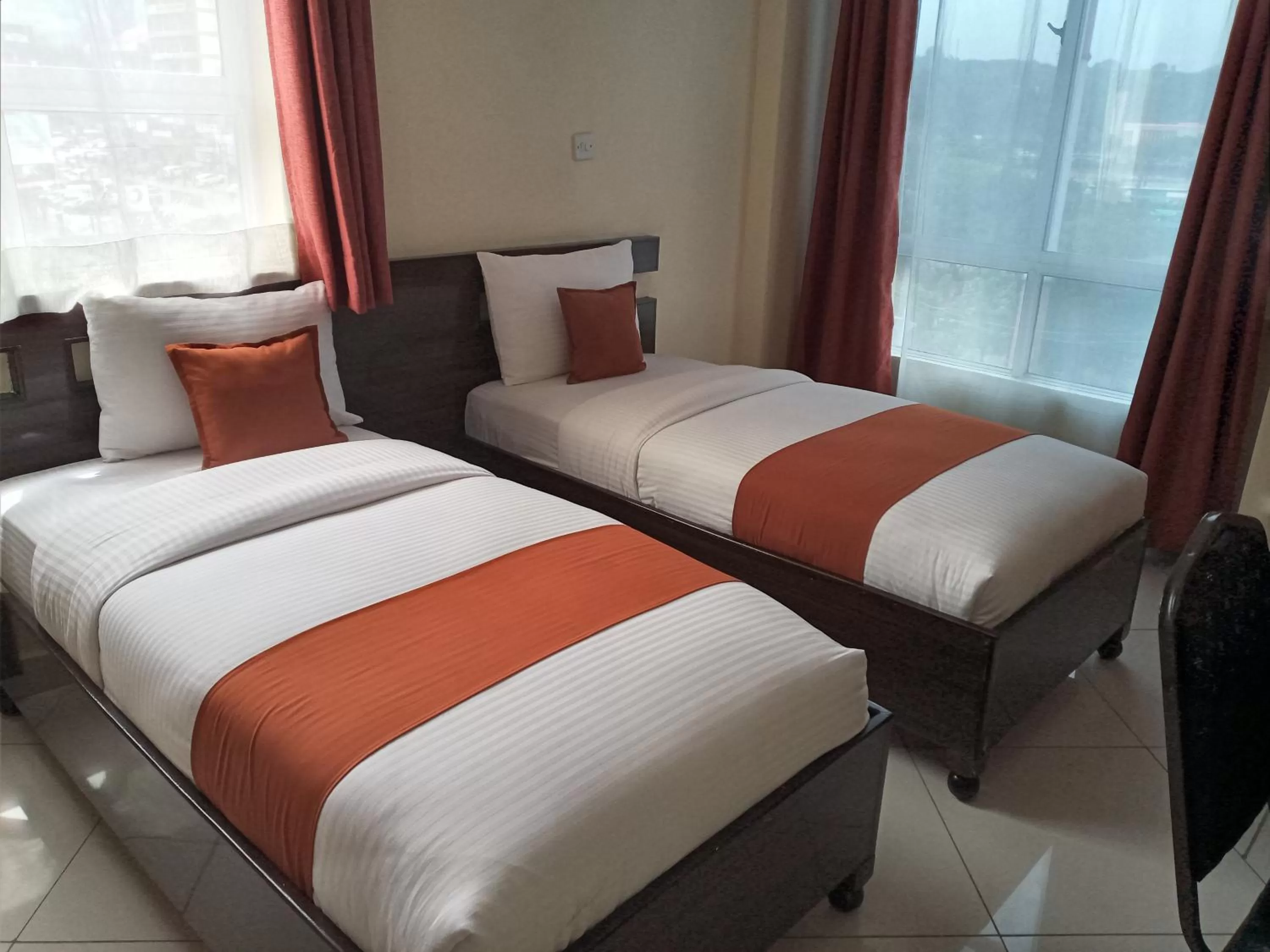 Bed in Claire de Lune Moonlight Hotel