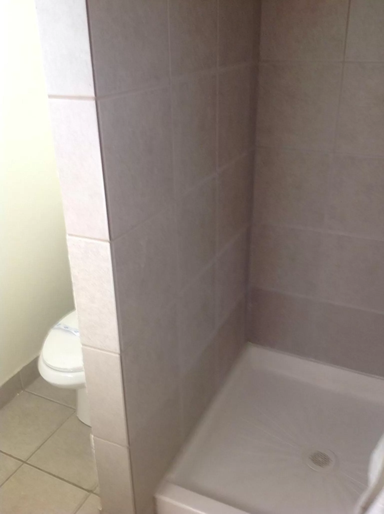 Shower in Budget INN At The Heavenly Gondola