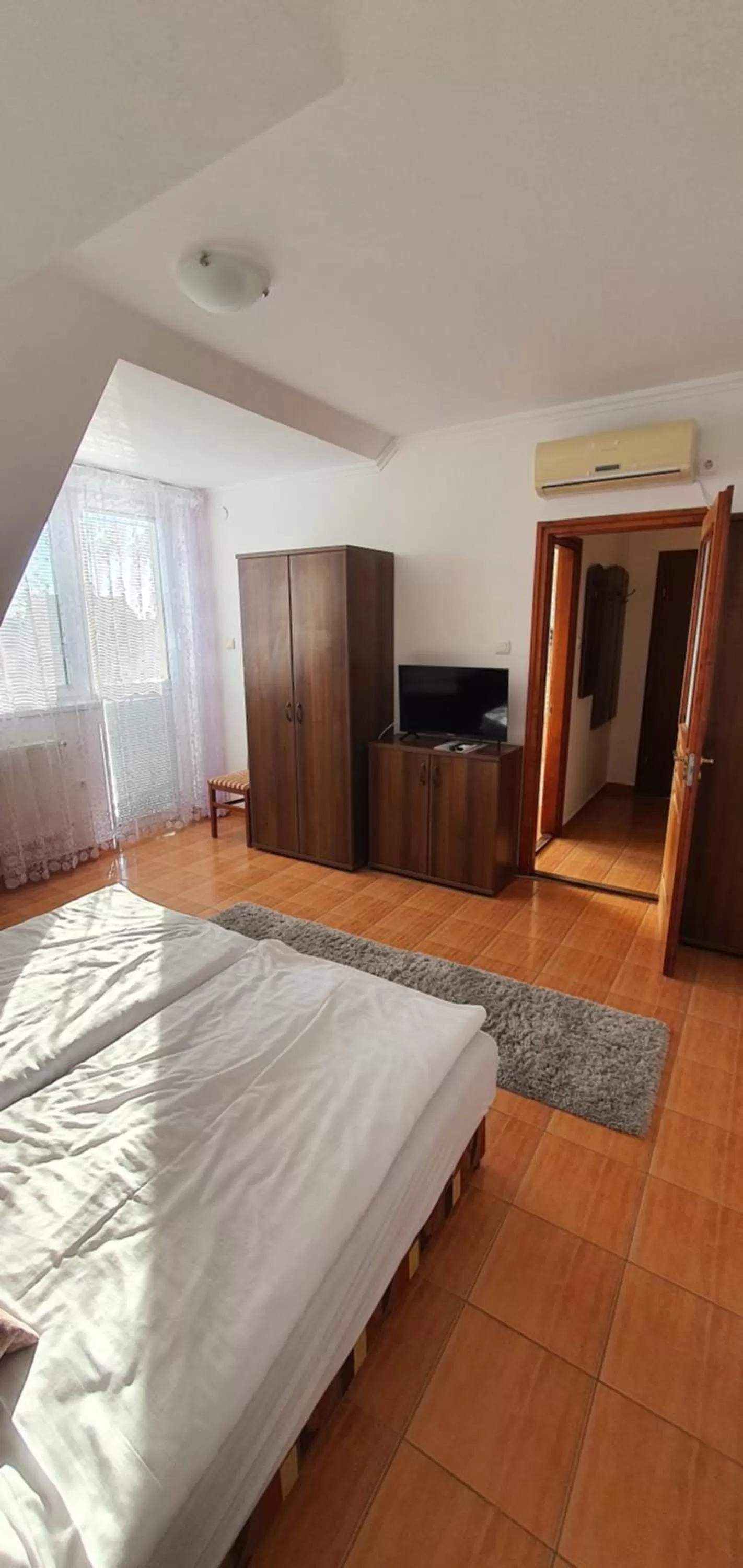 Bed in Aqua Oazis Apartman