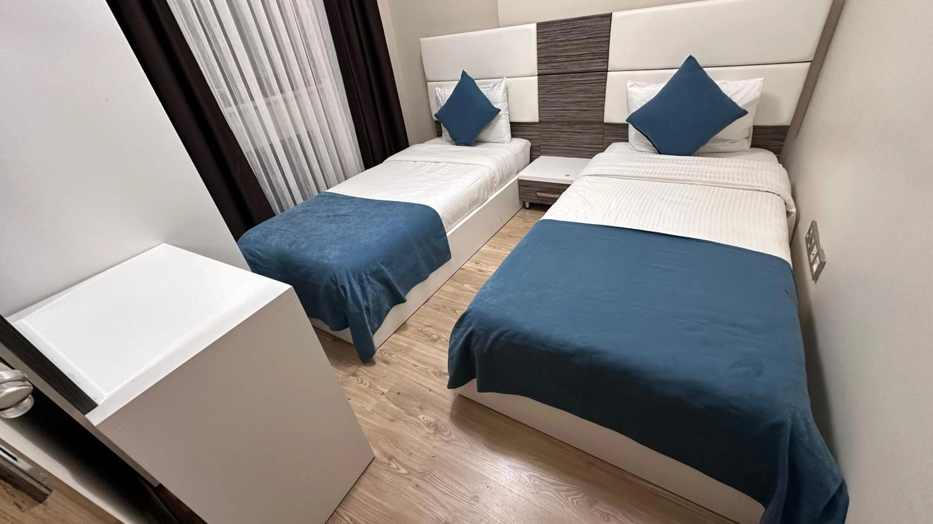 Bed in Overland Residence