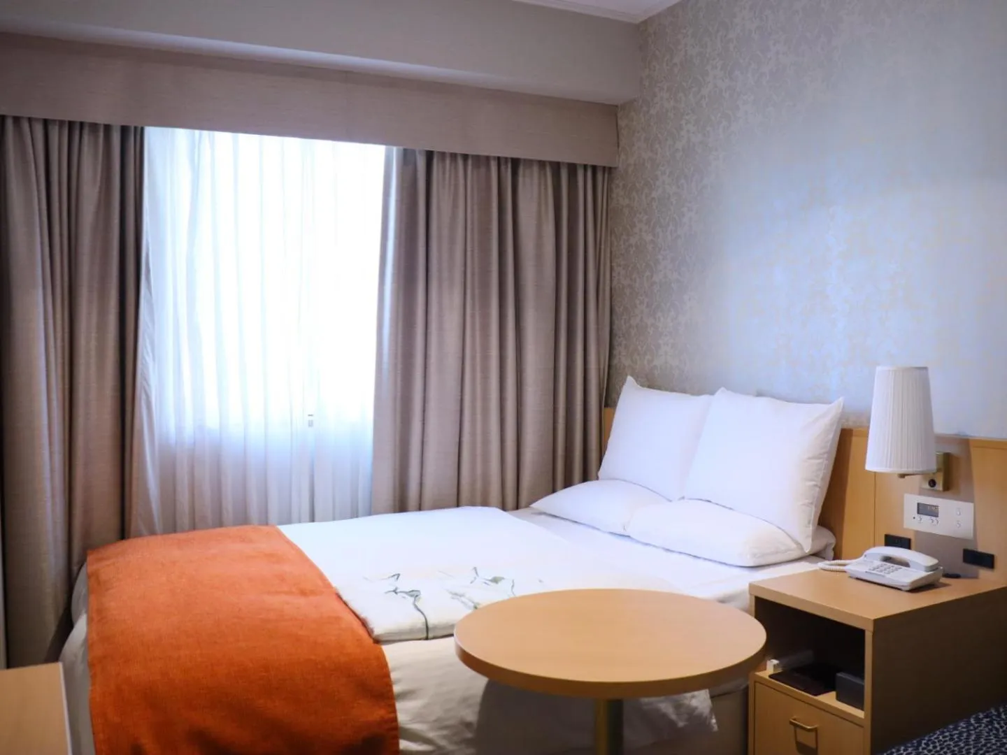 Bed in Hotel Rose Garden Shinjuku