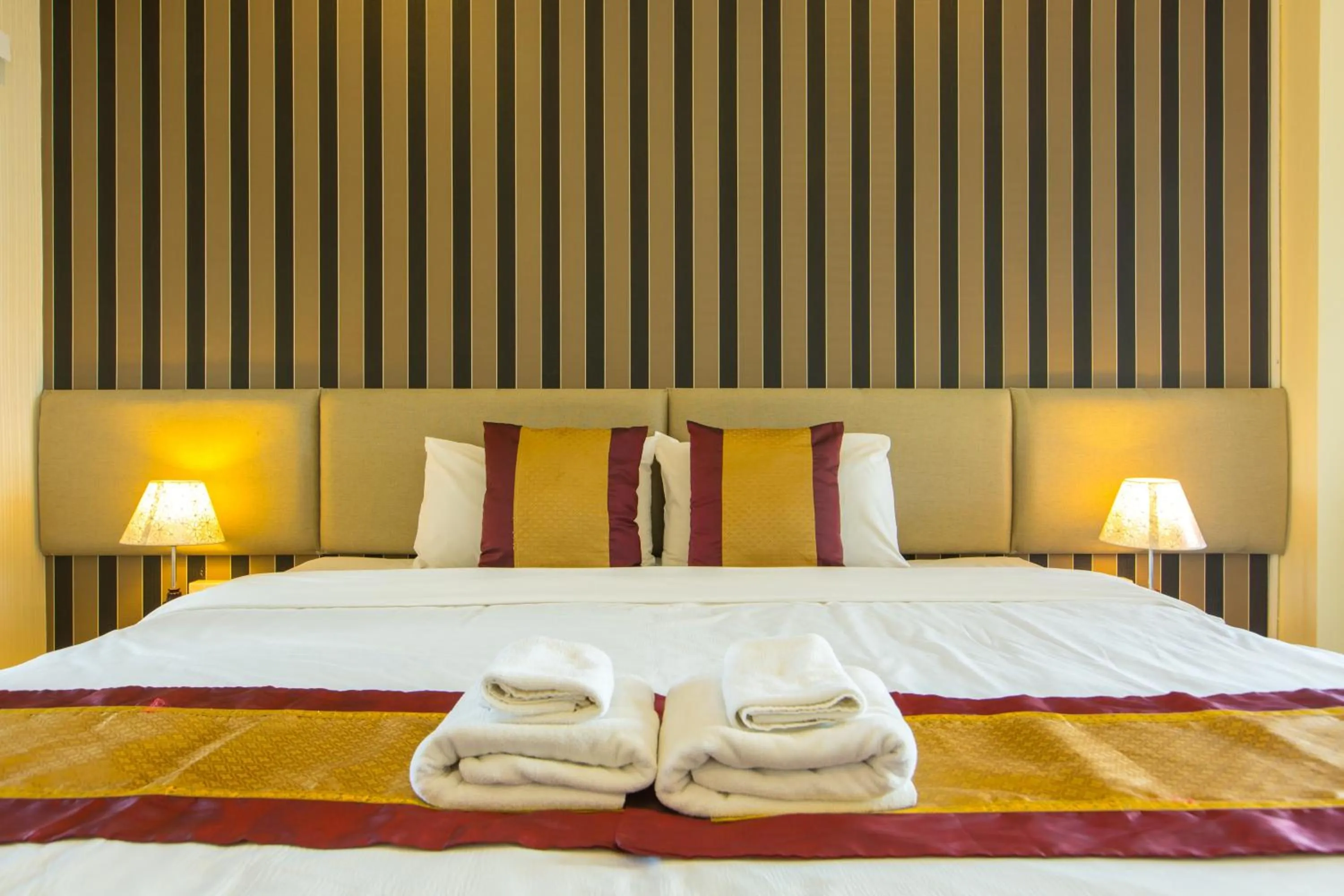 Decorative detail, Bed in Chiang Mai Waroros Boutique Hotel