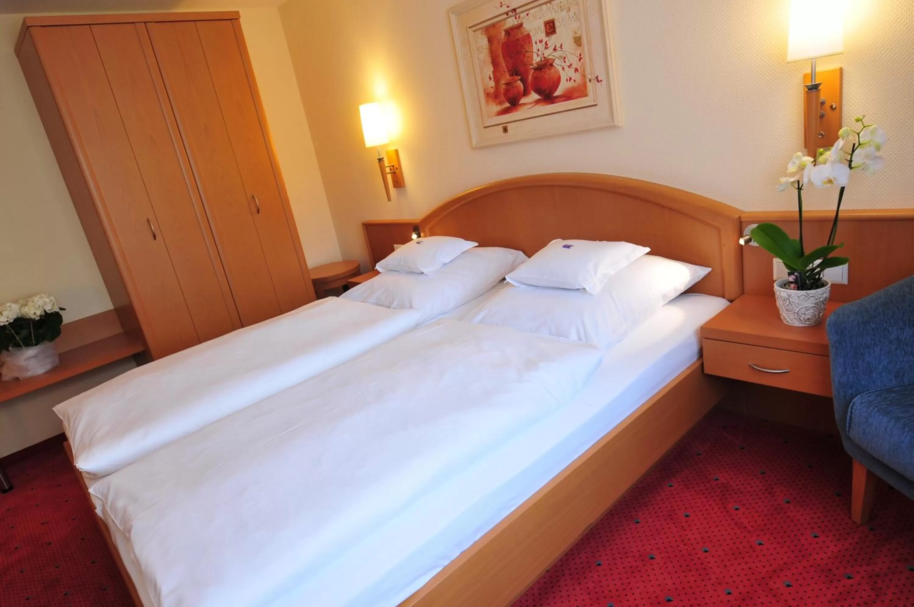 Bed in Flair Hotel Deutsches Haus