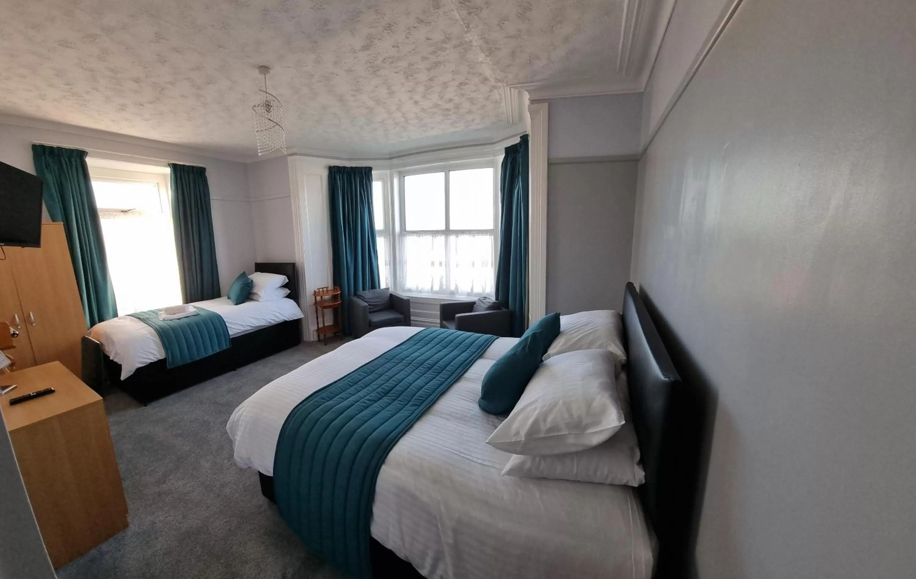 Photo of the whole room, Bed in City Inn