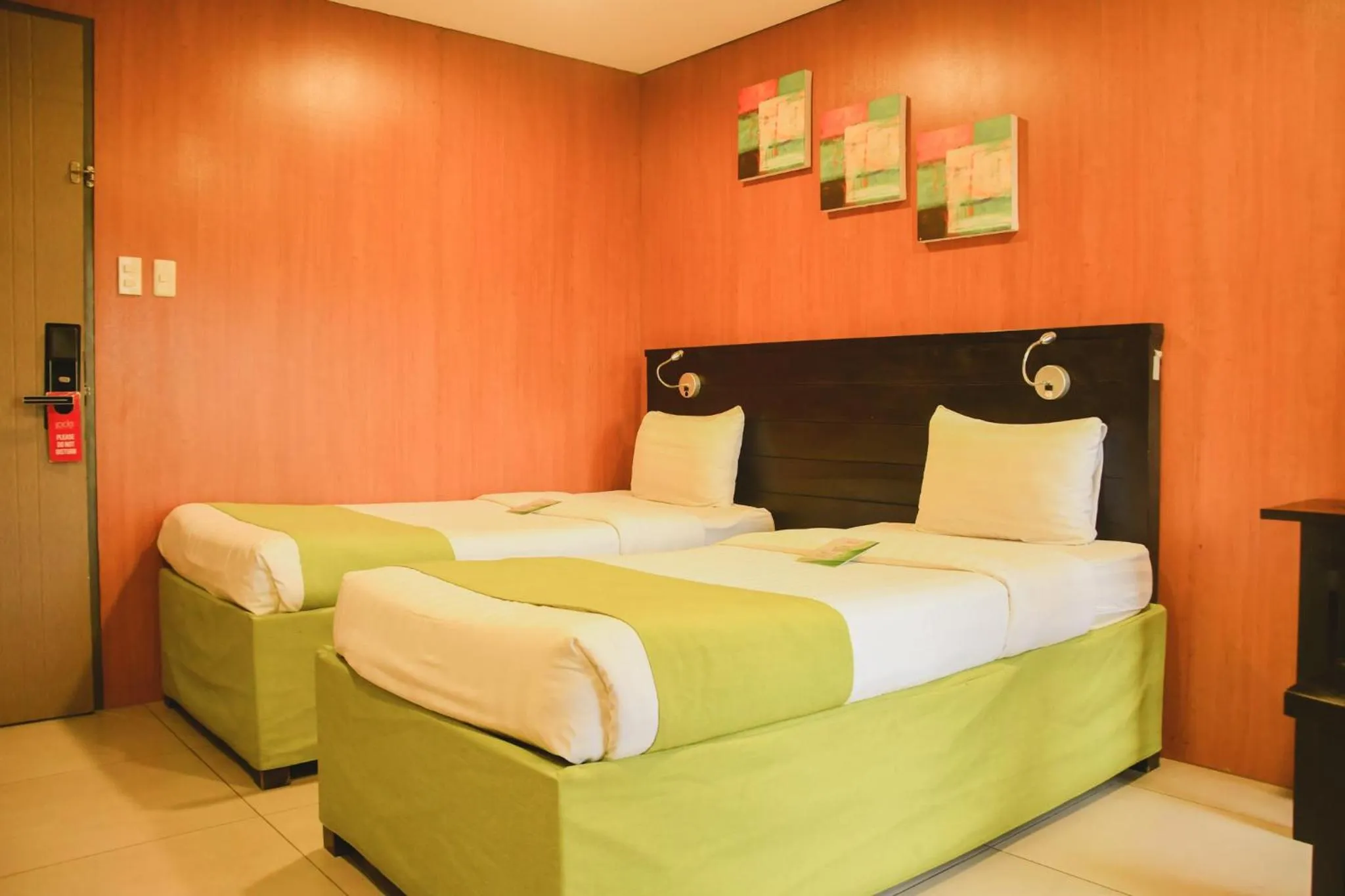 Bed in Jade Hotel and Suites
