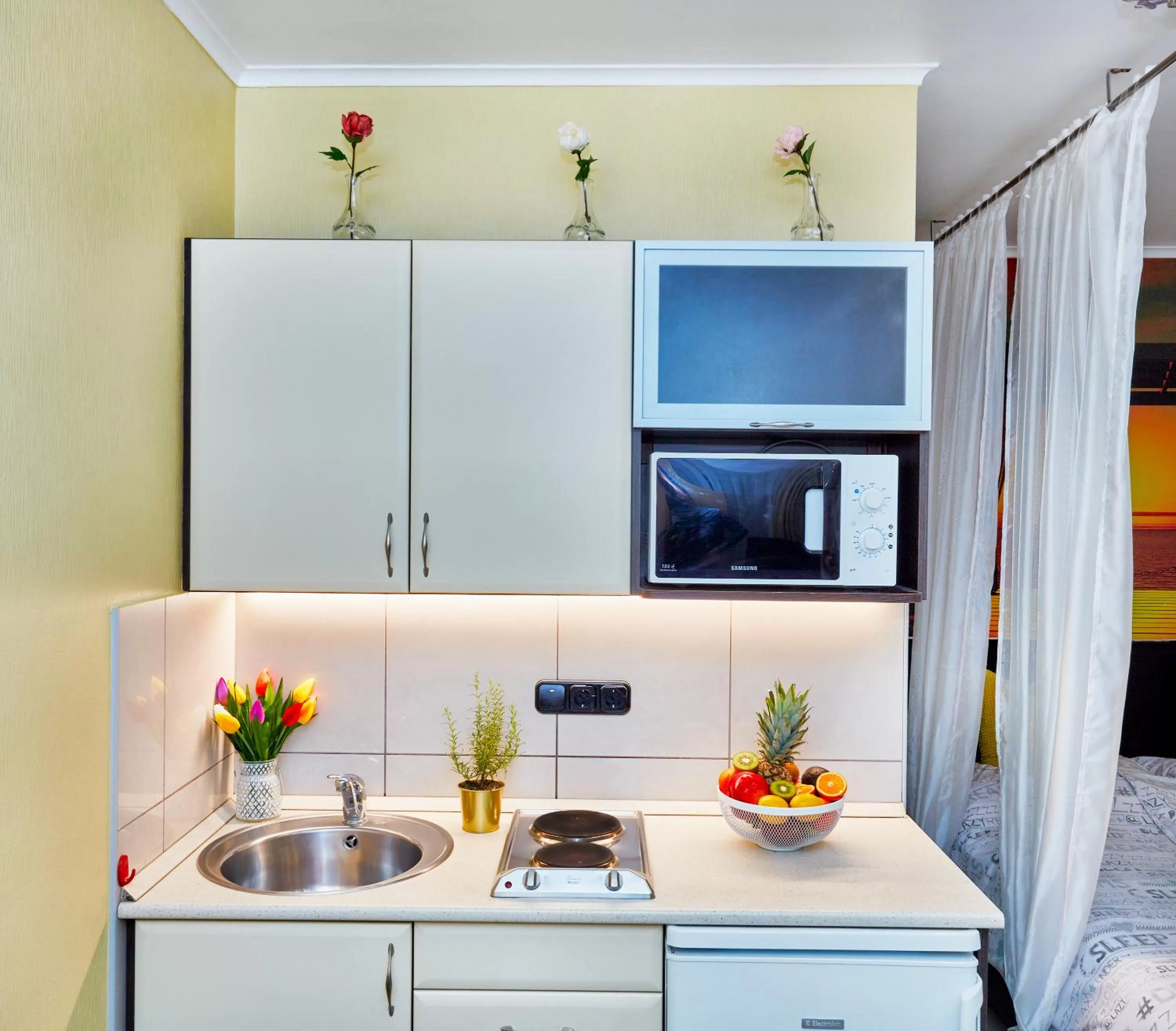 Kitchen or kitchenette in Vintiamo Apartmanok