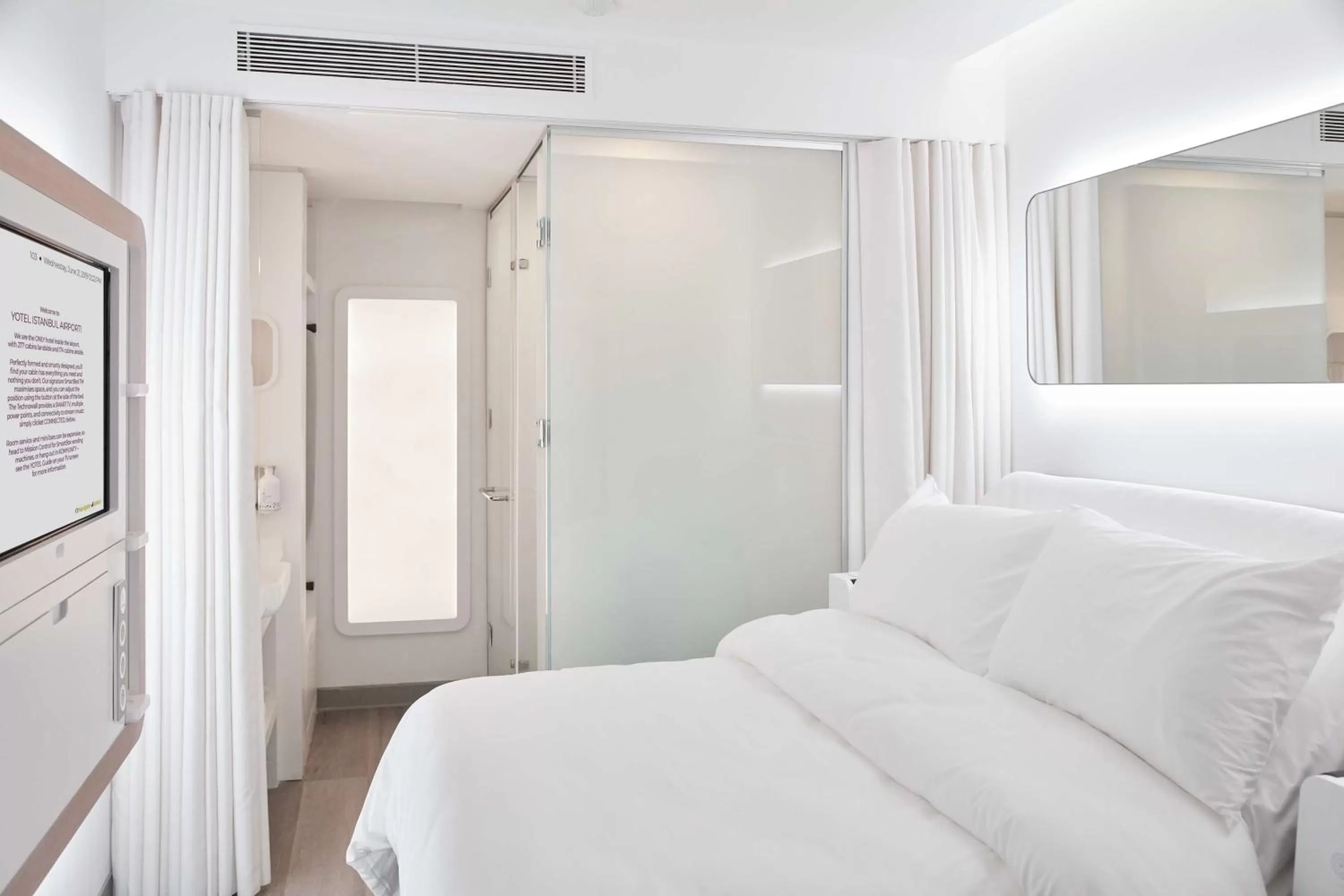 Bathroom, Bed in YOTELAIR Istanbul Airport, Duty free - International Transit area