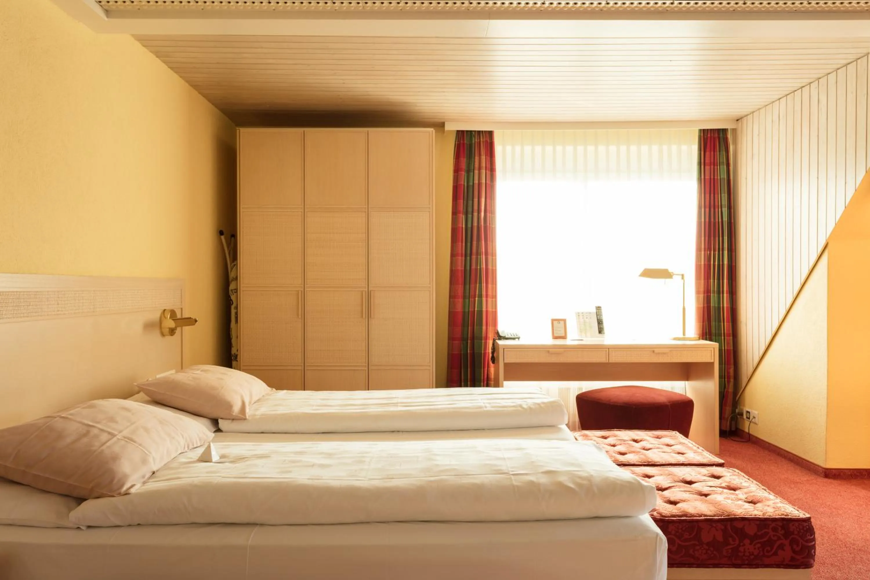 Bedroom, Bed in Engimatt City & Garden Hotel