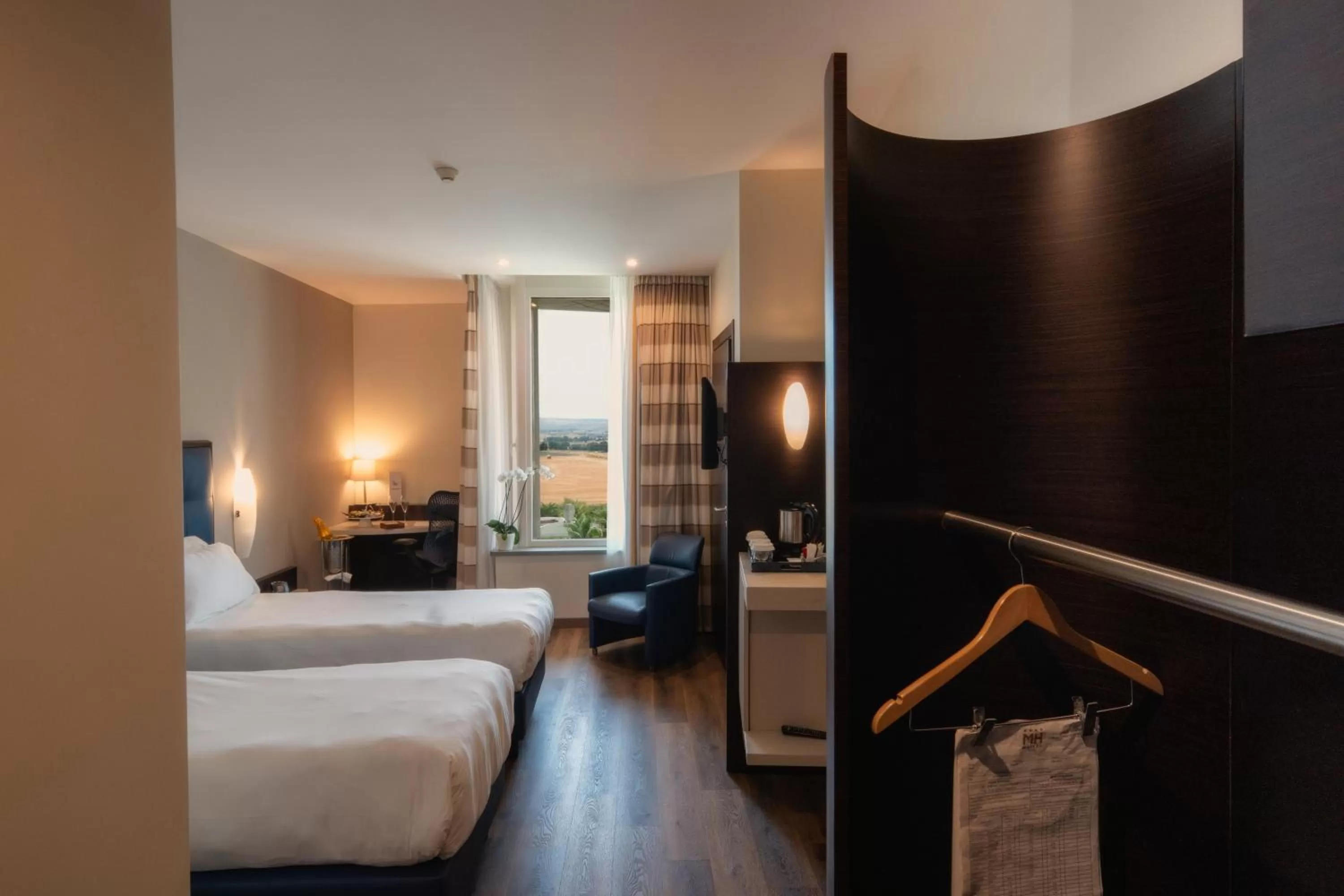 Bedroom, Bed in UNA HOTELS MH Matera