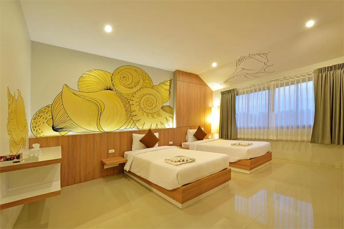 Bed in Tairada Boutique Hotel