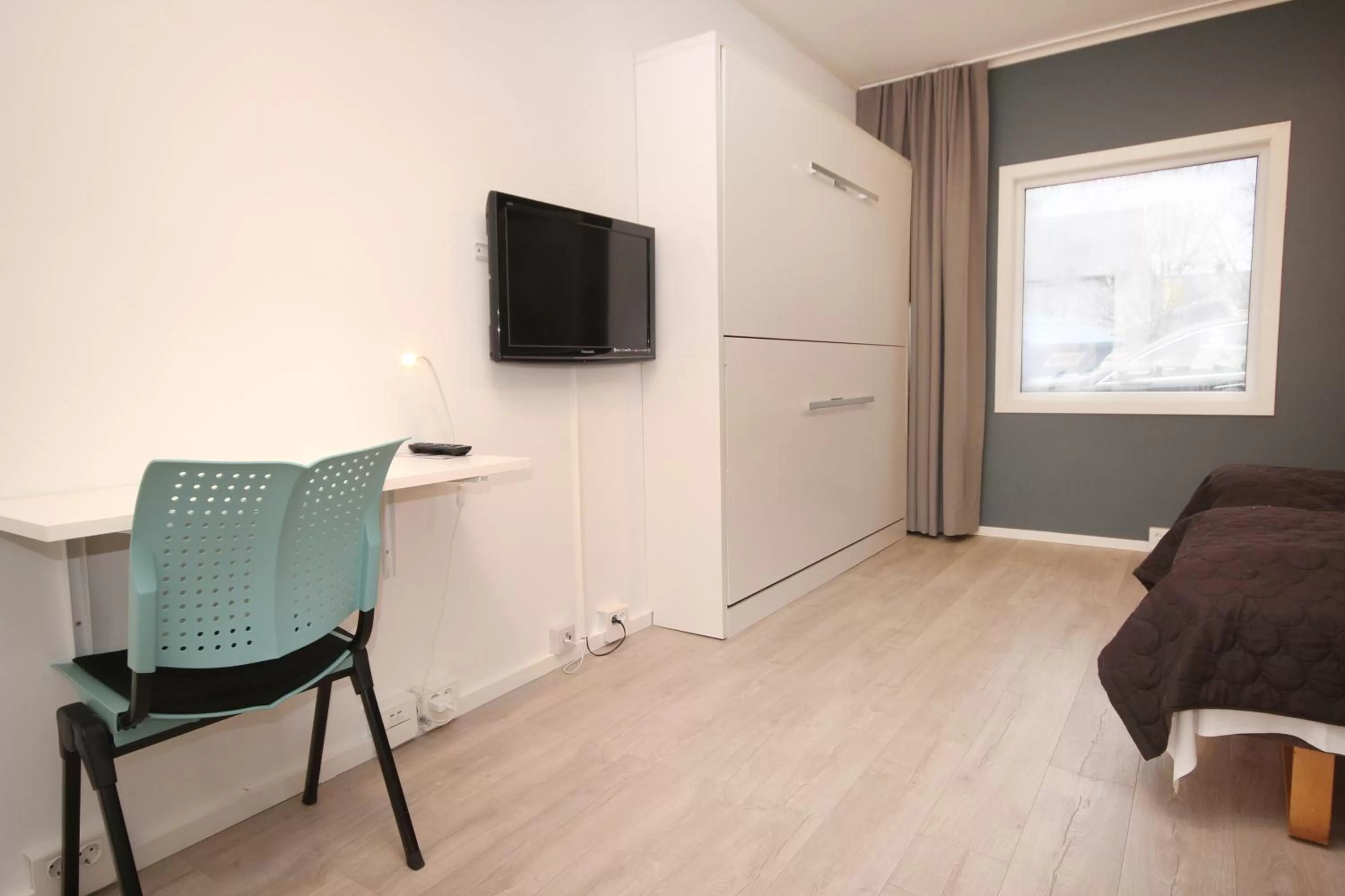 Bedroom in Napoli Resturant & Hotell AS