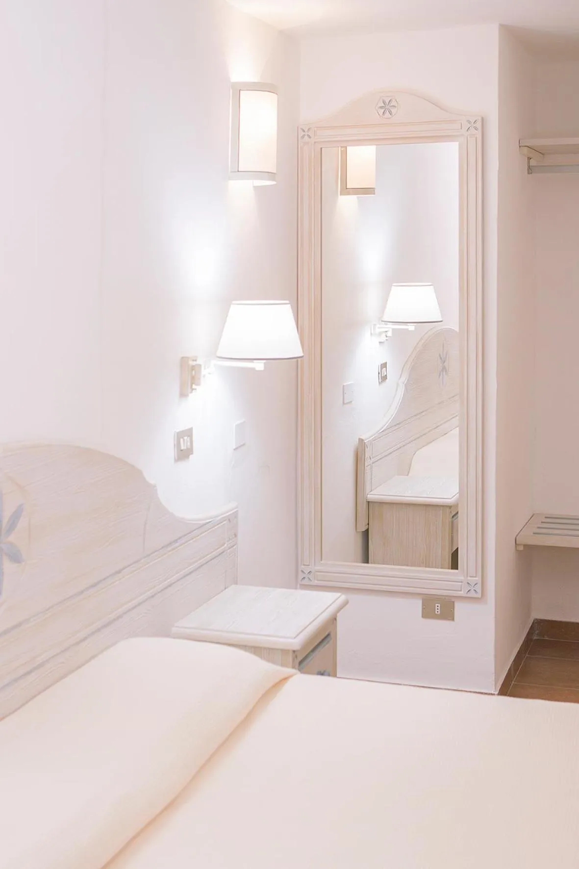 Decorative detail, Bed in Colonna Beach Hotel Marinella